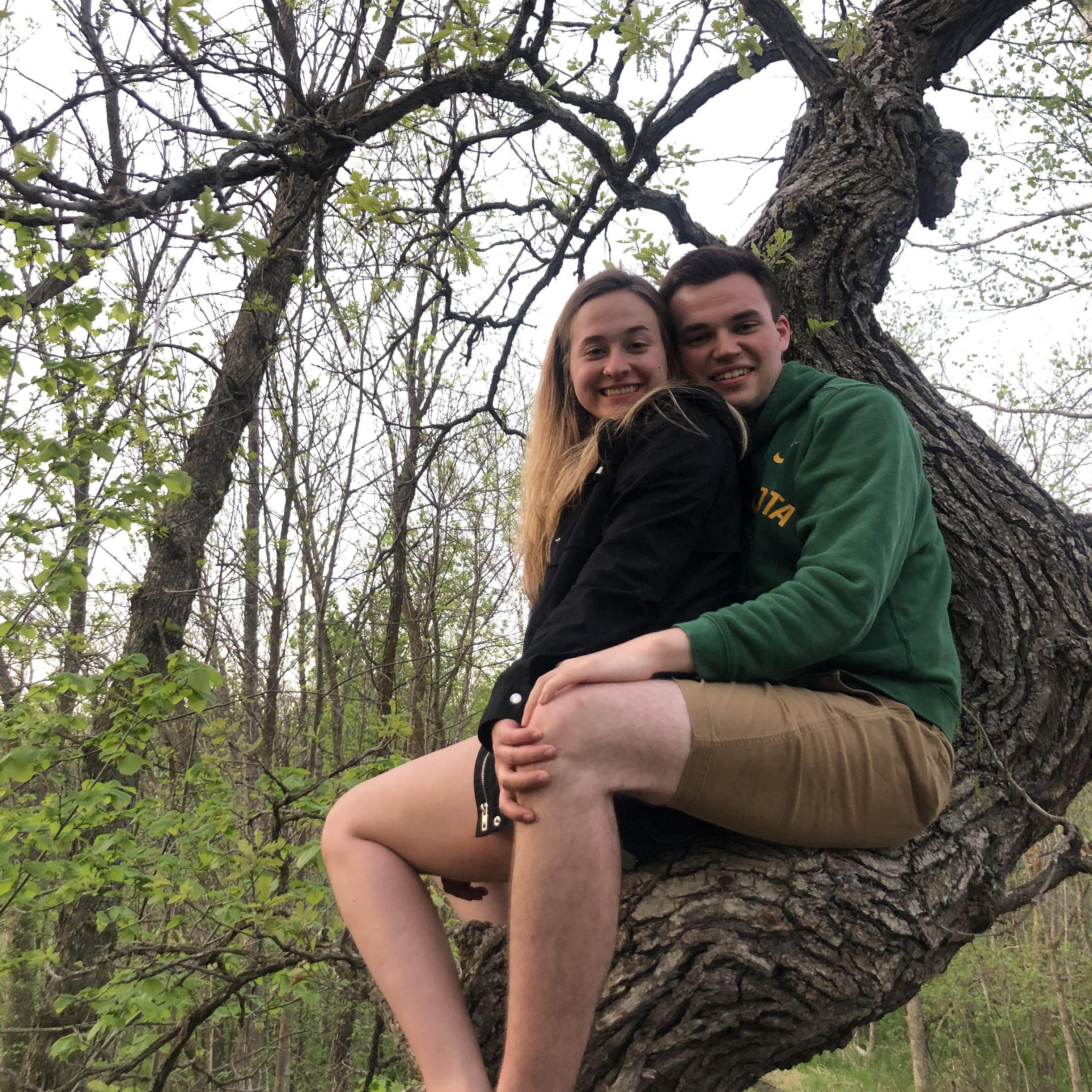 Our first photo together in the Crooked Tree at Alex’s parent’s property AKA Crooked Tree Acres AKA our wedding venue. Lexie's second year invited. May 2020.