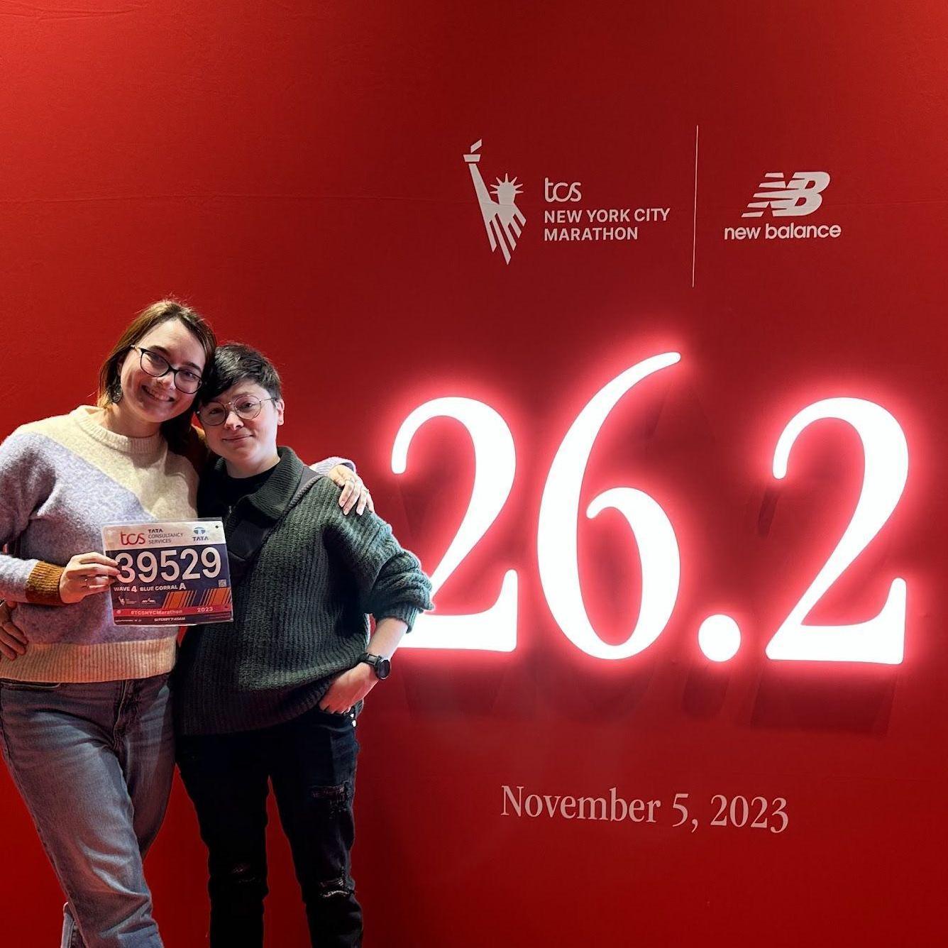 Lydia loves running marathons while Jack loves making cute signs to support Lydia running marathons.