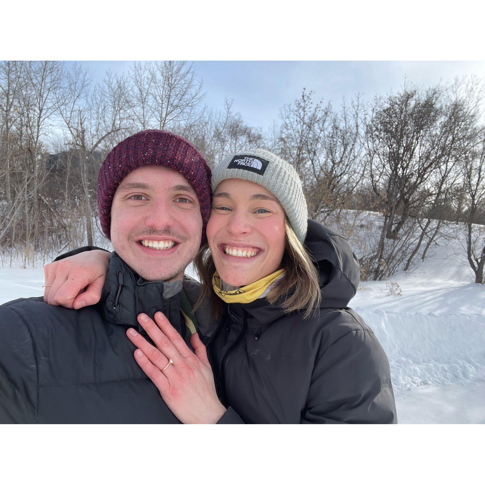 We're both smiling because Mike didn't lose the ring in the snow bank where his roommate had left it