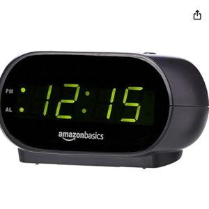 Amazon Basics Small Digital Oval Alarm Clock With LED Display, Nightlight & Battery Backup, Black, 4.5 x 3.5 x 2.4 Inches