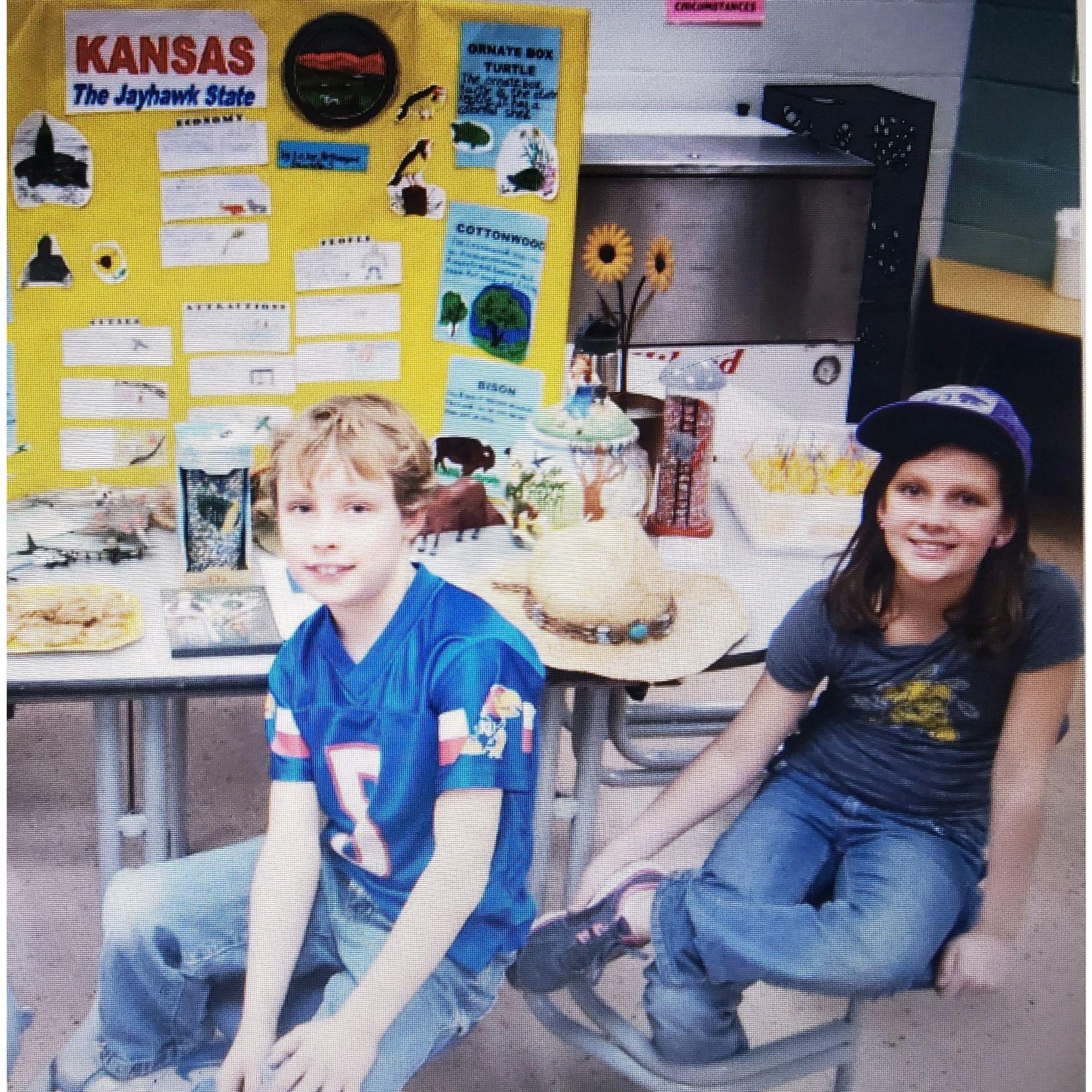 Us in front of our Kansas day presentation in 3rd grade
