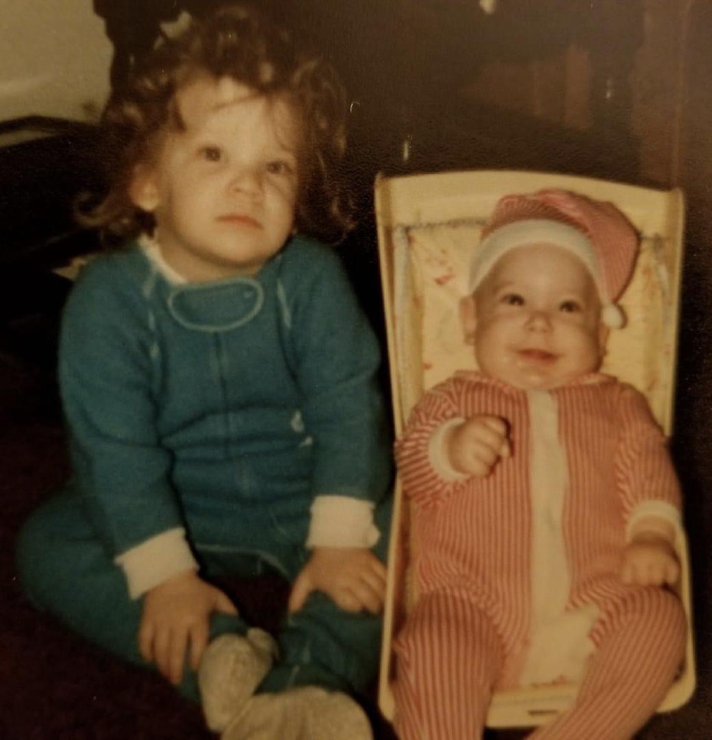 Baby Scott chillin with his big sister Stacie