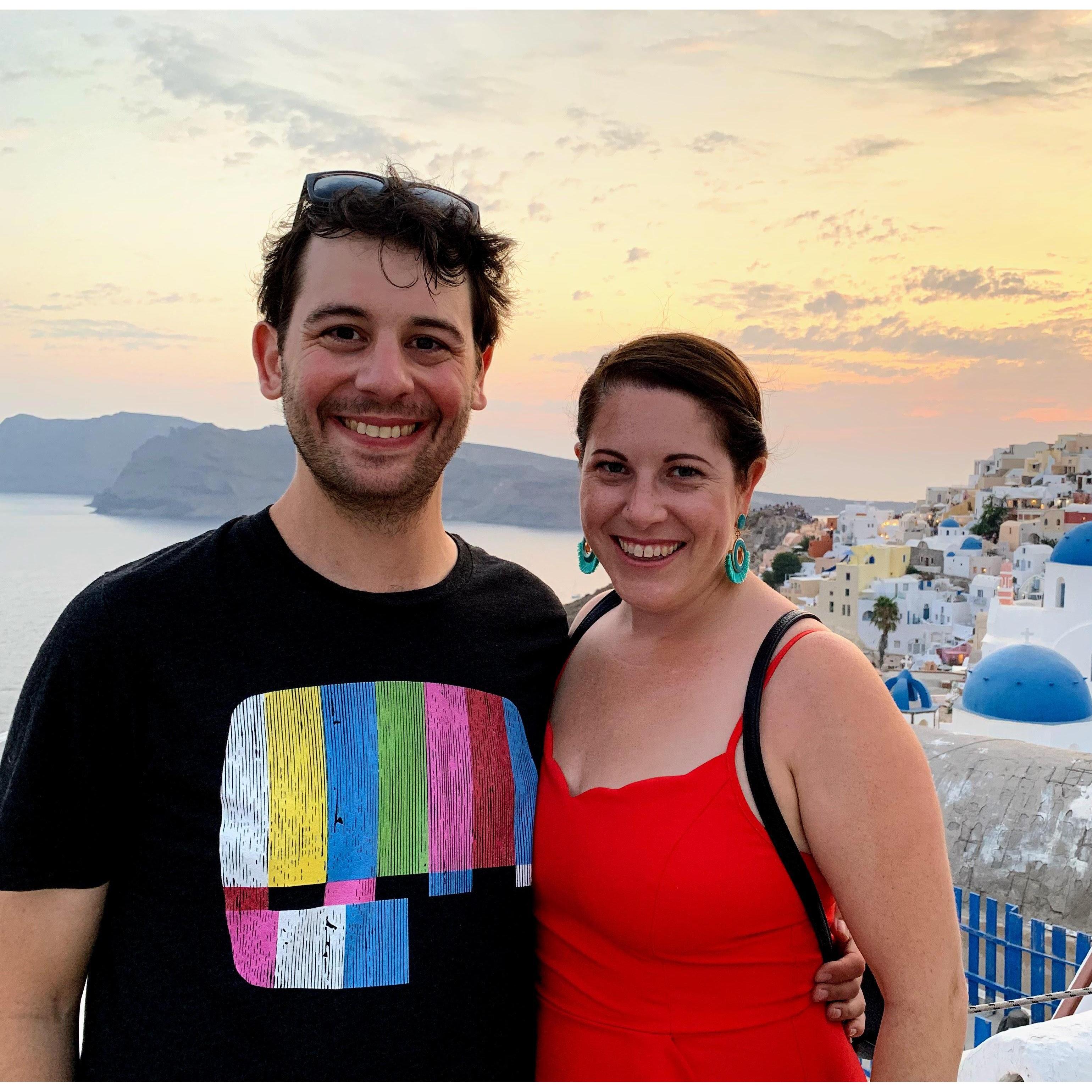 Our first international trip together - Greece! Here we are catching sunset in Oia on the isle of Santorini