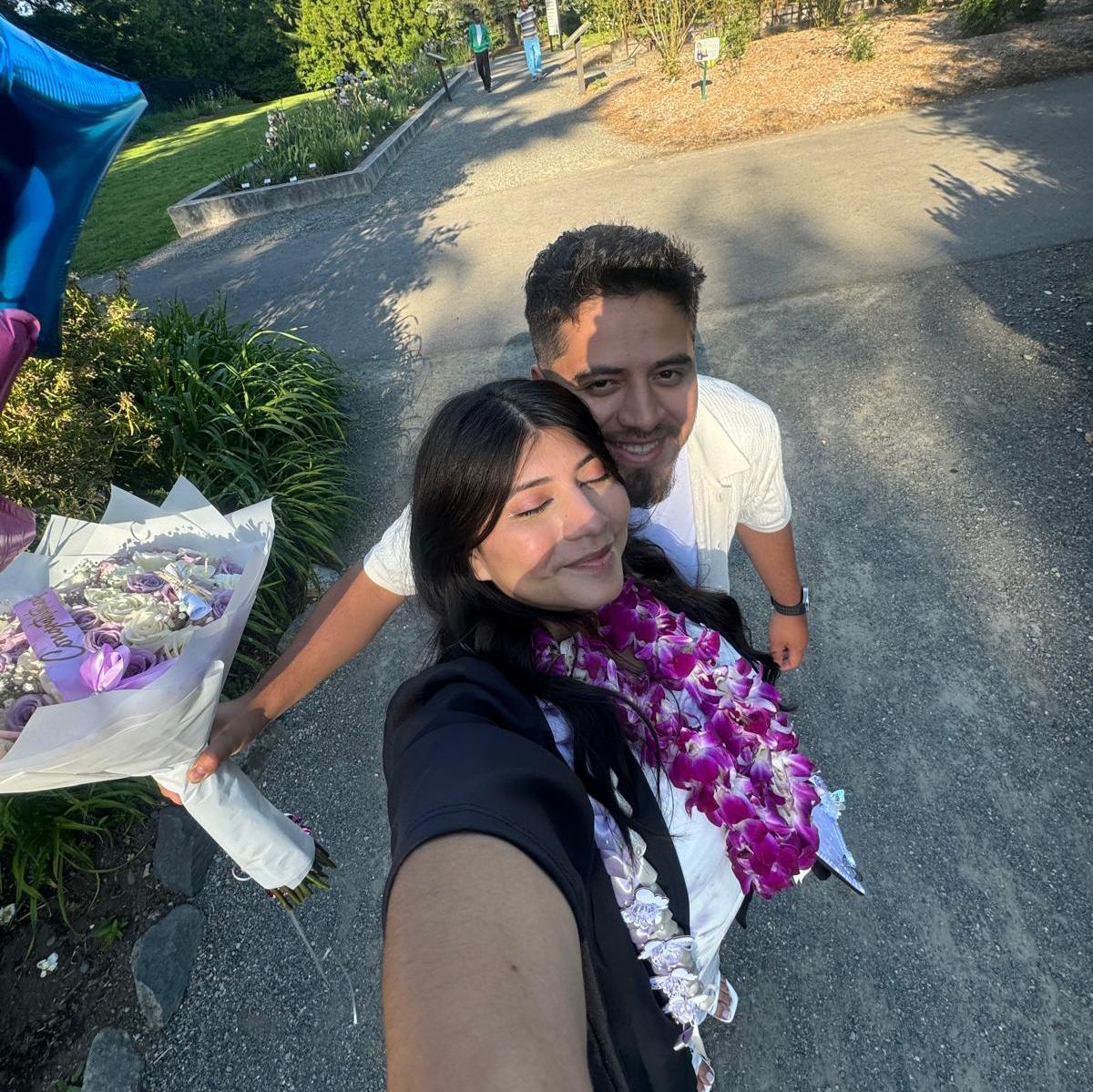 The day I graduated! Adonay insisted on taking me to a garden for some pictures. El dia que me gradue de la Universidad, Adonay insistio en llevarme a un jardin para tomarme fotos.