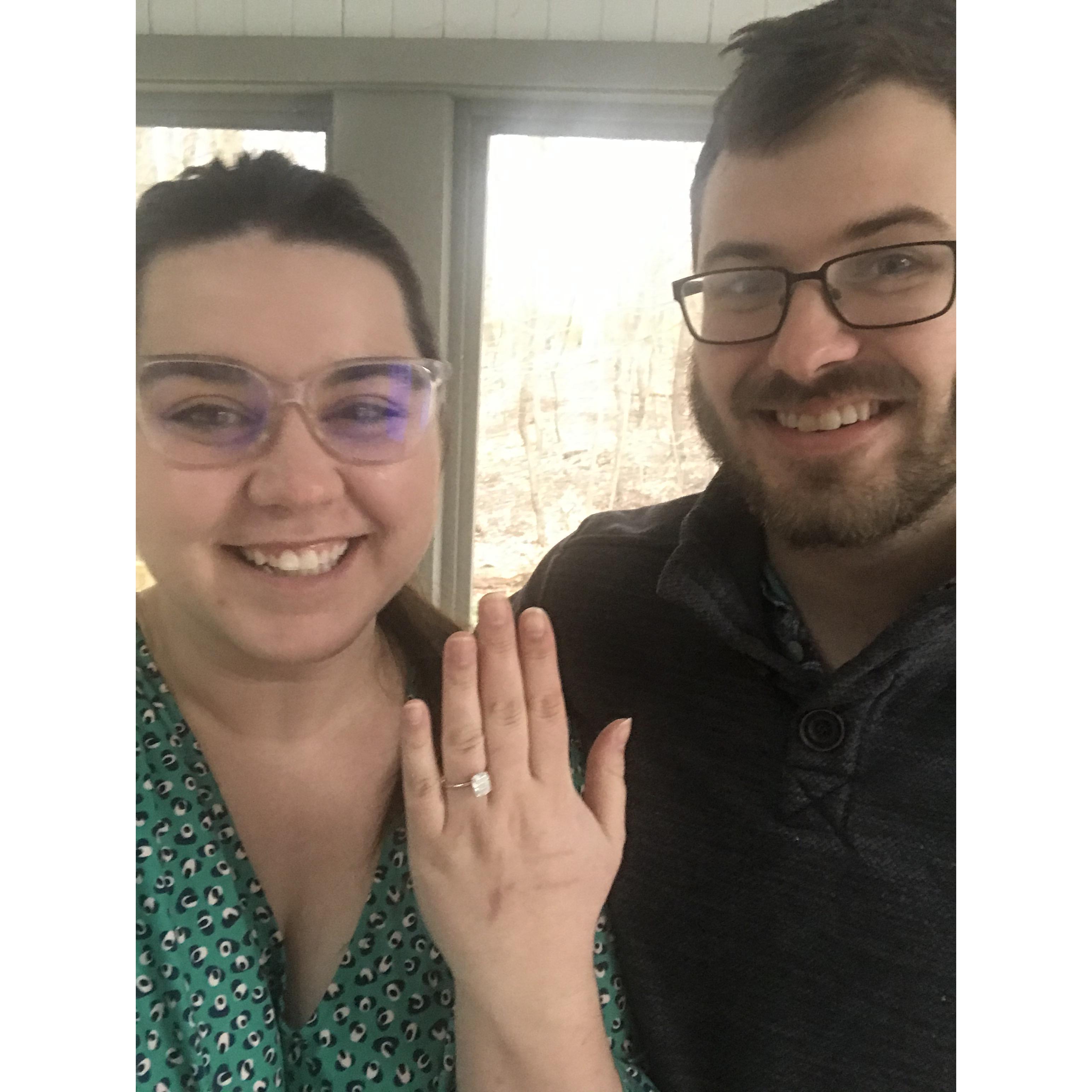 Alli and Drew, shortly after Alli said "Yes!" on their back porch on a sunny spring afternoon.