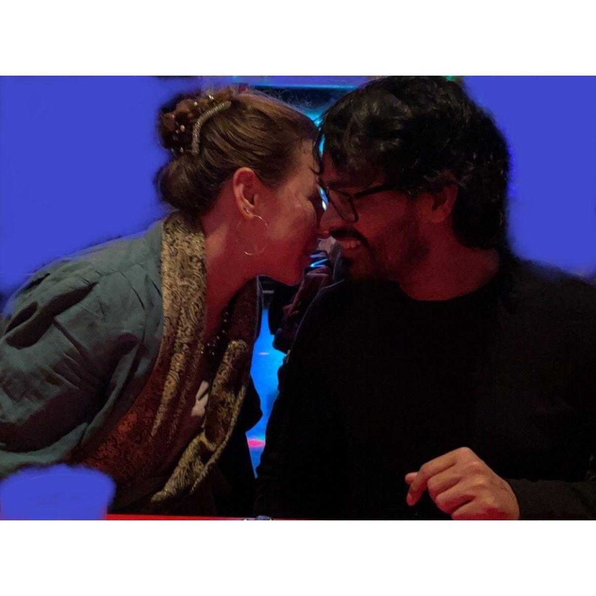 Candid photo of us taken by a friend. My mom said "You two look in love!"
