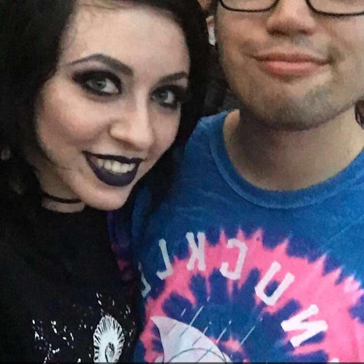 Our first photo ever taken together on our FIRST date at Blink 182.
