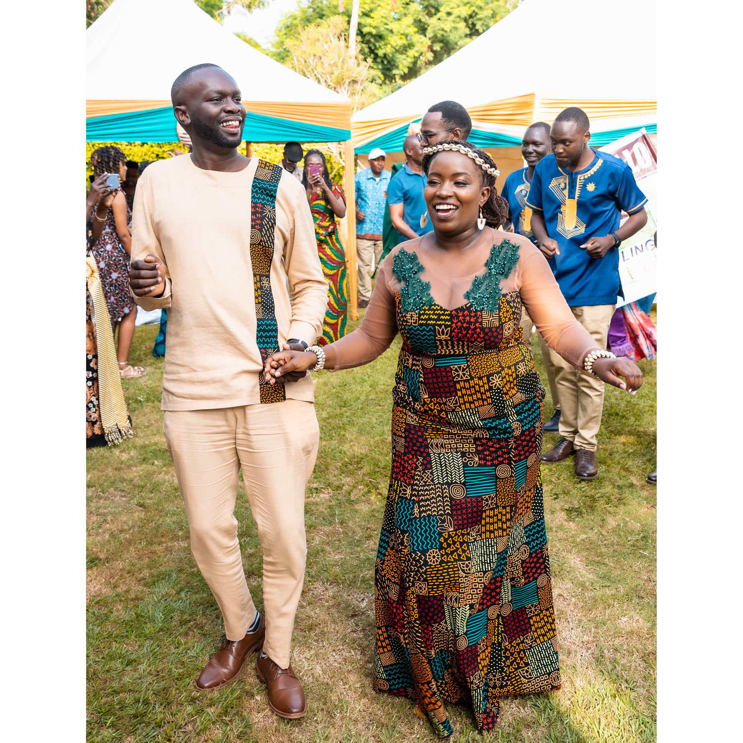 Josh dancing with me after choosing correctly from under a lesso during our ntheo function. He definitely passed this one!