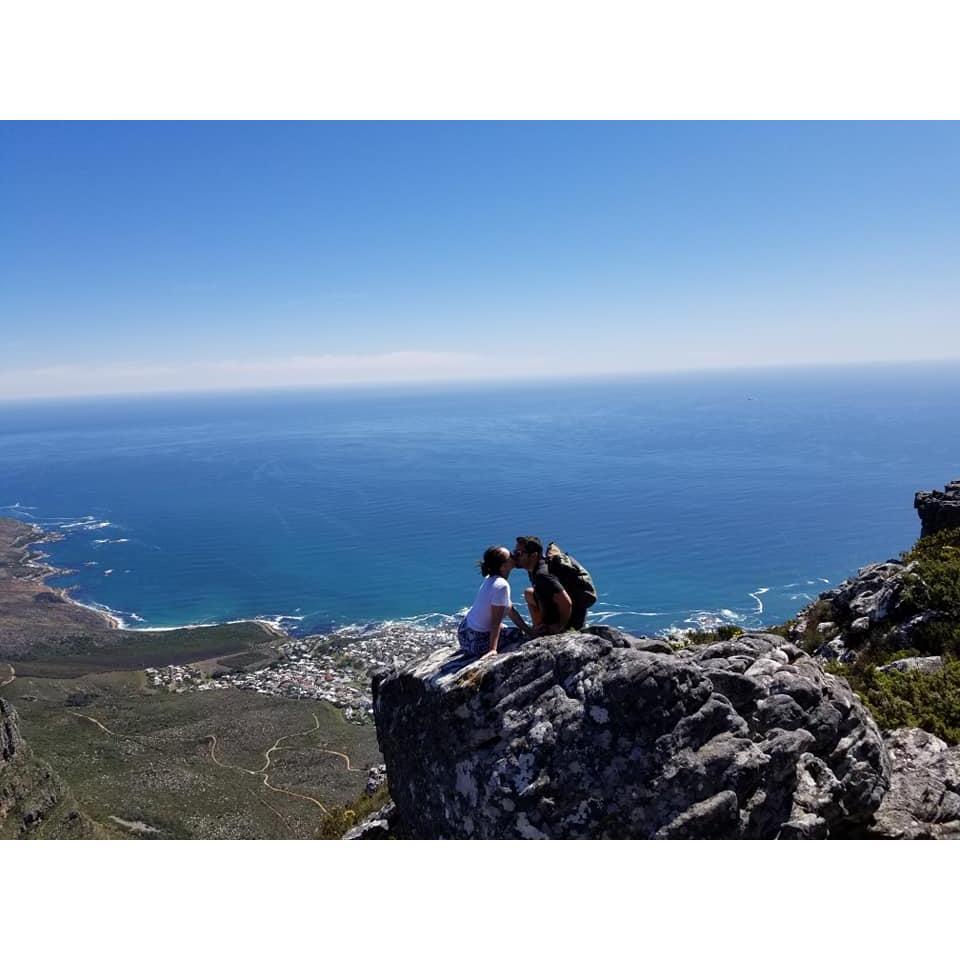 Kissing at the top of Table Mountain in Cape Town South Africa