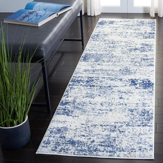 SAFAVIEH Amelia Collection Runner Rug - 2'2" x 8', Ivory & Navy, Modern Abstract Design, Non-Shedding & Easy Care, Ideal for High Traffic Areas in Living Room, Bedroom (ALA700B)