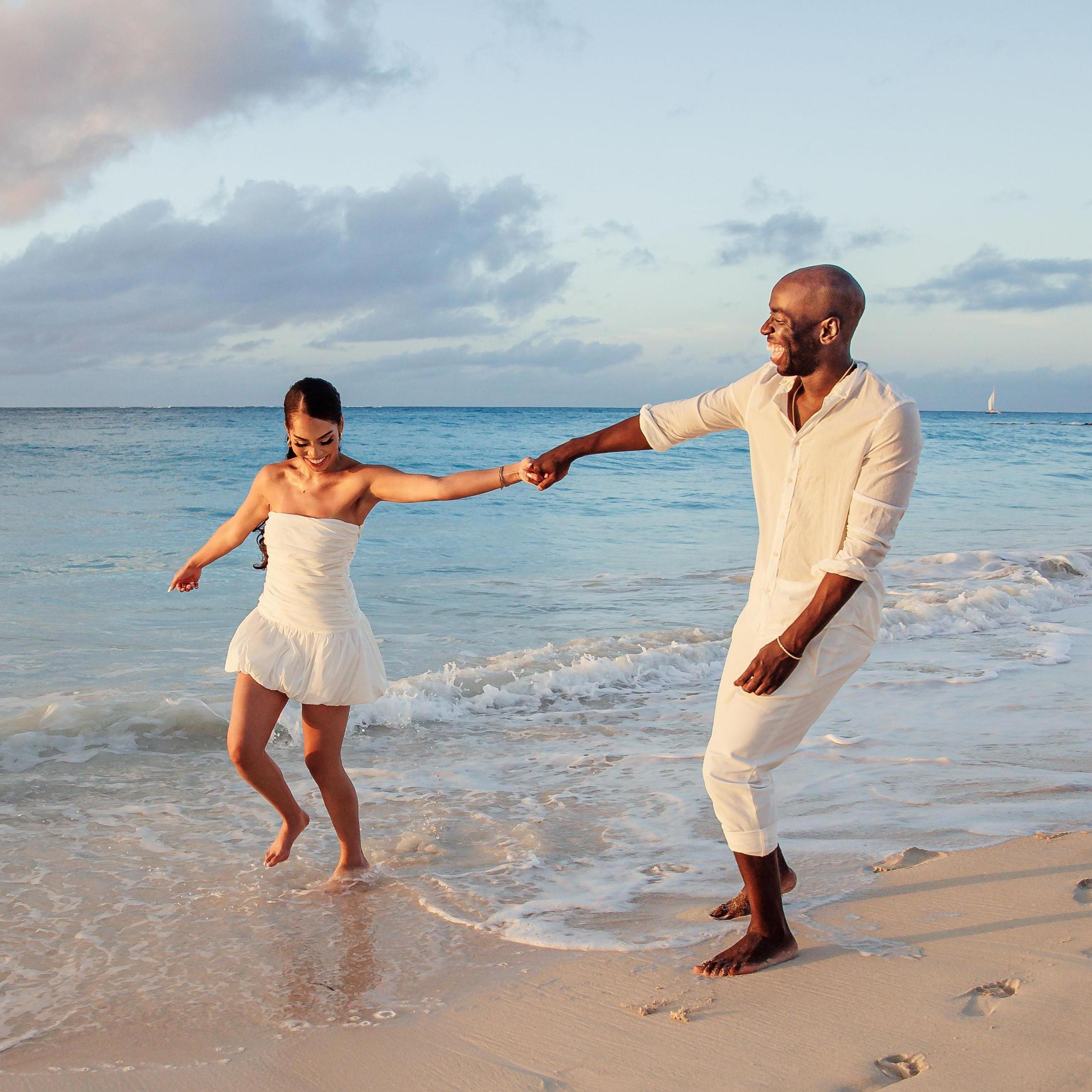 Frolicking with my fiancé (and trying not to drop the ring in the ocean).