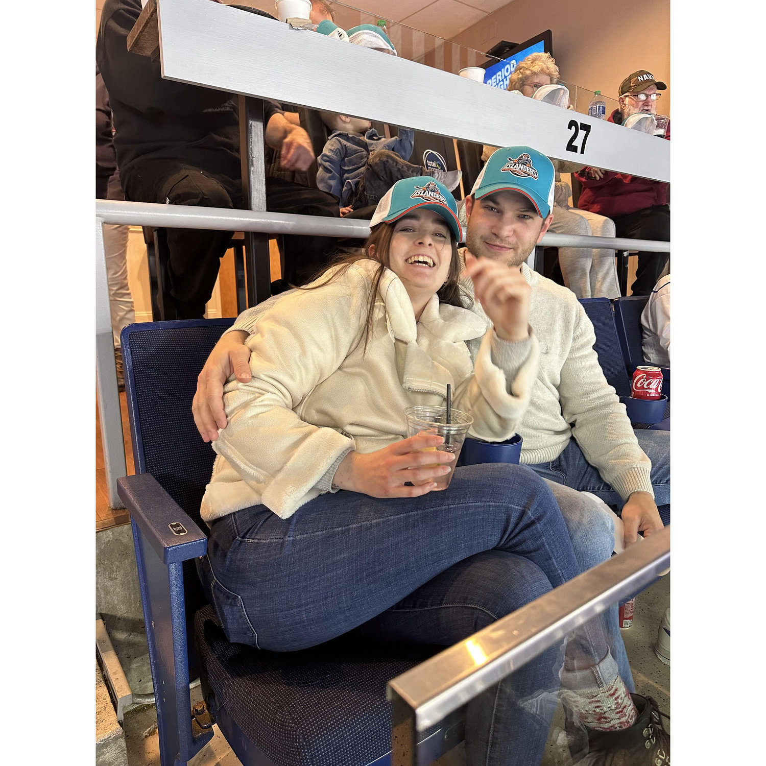 My first hockey game. The LaFountains all split a booth!