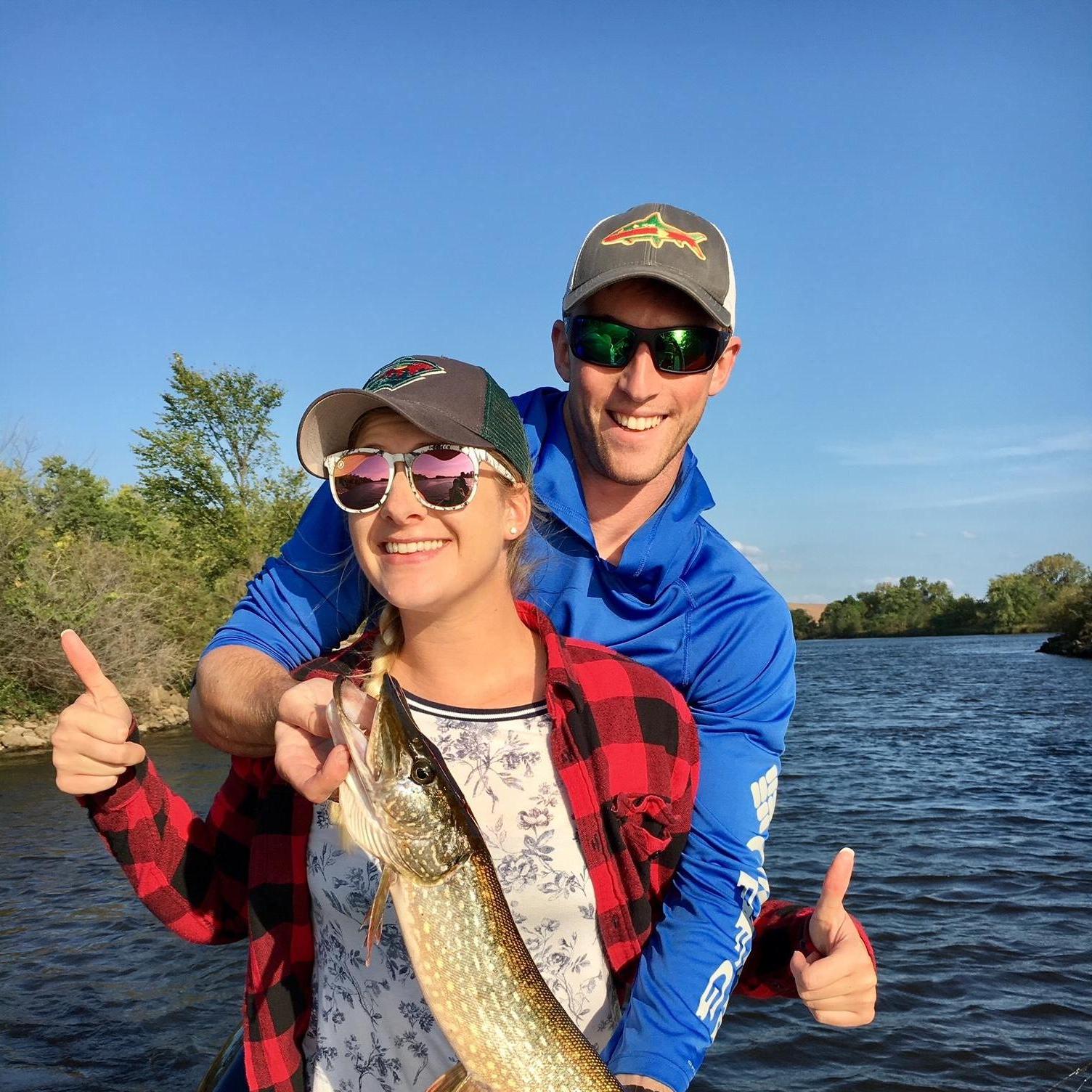 Of course there is a fishing photo! This was after Kira caught one of her first fish, this huge pike fish on the Mississippi river in Sept 2017. Kira didn't want to touch it, so Ajay did!