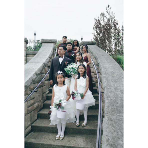 With the groomsmen, bridesmaids, and flower girls!