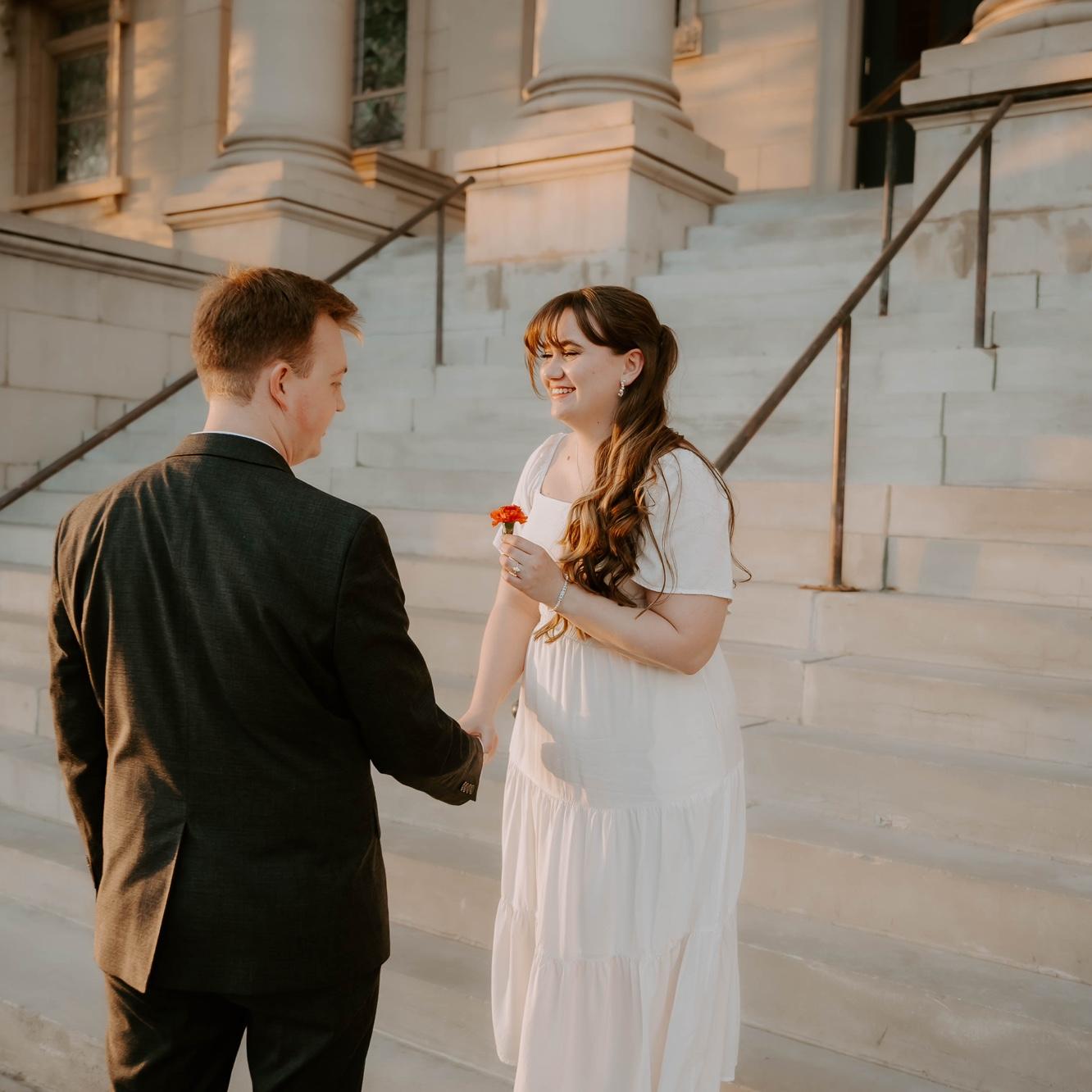 Fun fact: this flower was not a prop I brought for pictures. I literally saw it laying on the steps and picked it up, Gabe told me not to touch random flowers and I giggled at him.