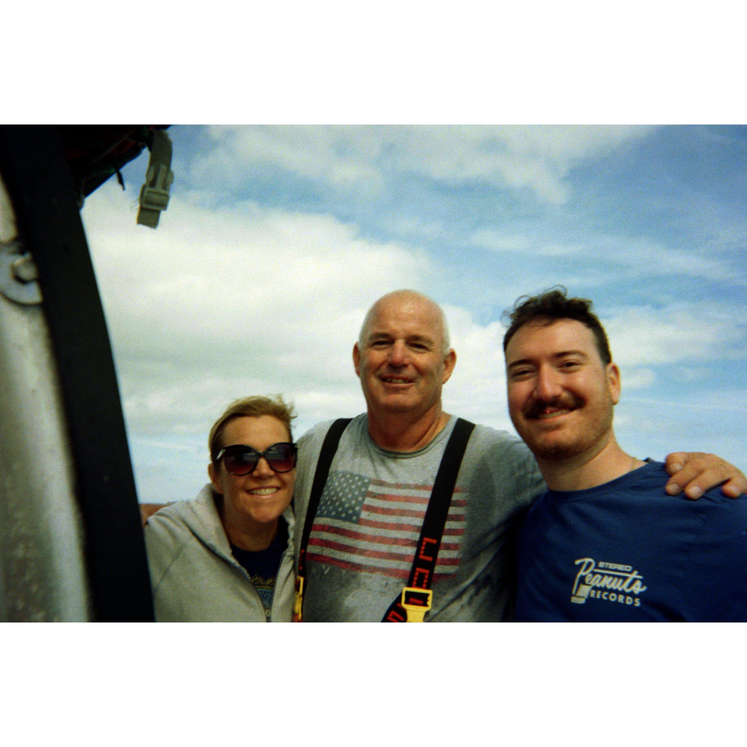 Alex with Chael's parents, Scott and Cara. Out on the boat.