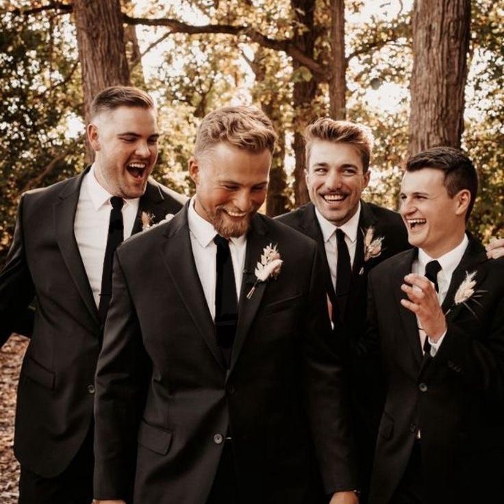 Groomsmen and fathers we would like to dress in black suits and black ties!