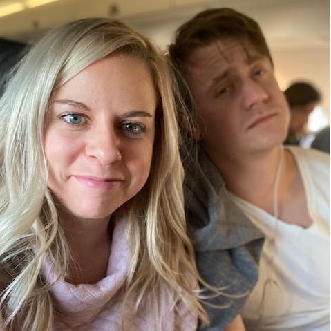 Catching an early flight! One of us is a morning person, and the other...not so much.