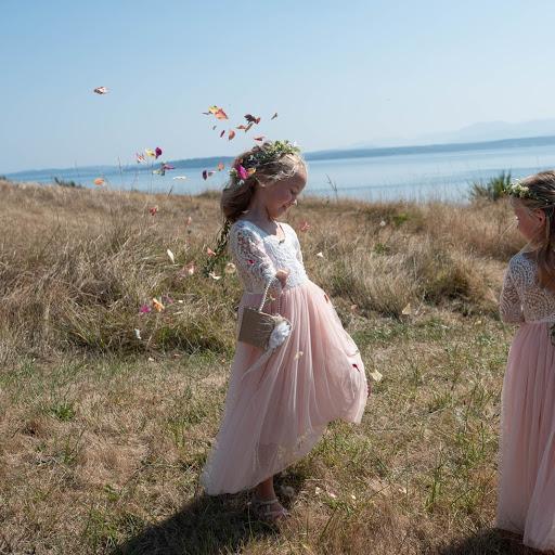 Aubrey and Carolyn were throwing flower petals at each other and giggling the whole way down.