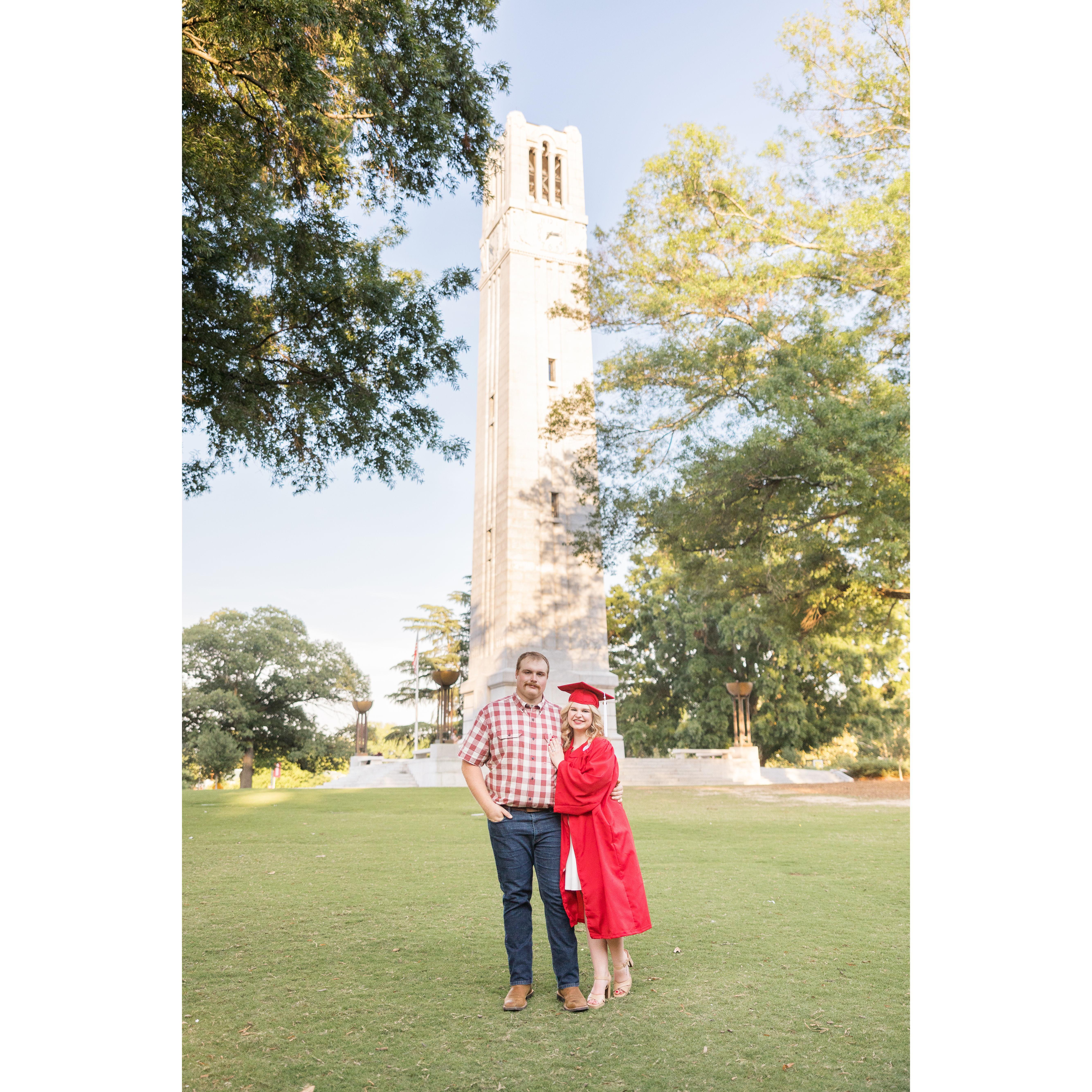 Hudson proposed right before this picture at the bell tower on NC State's campus.