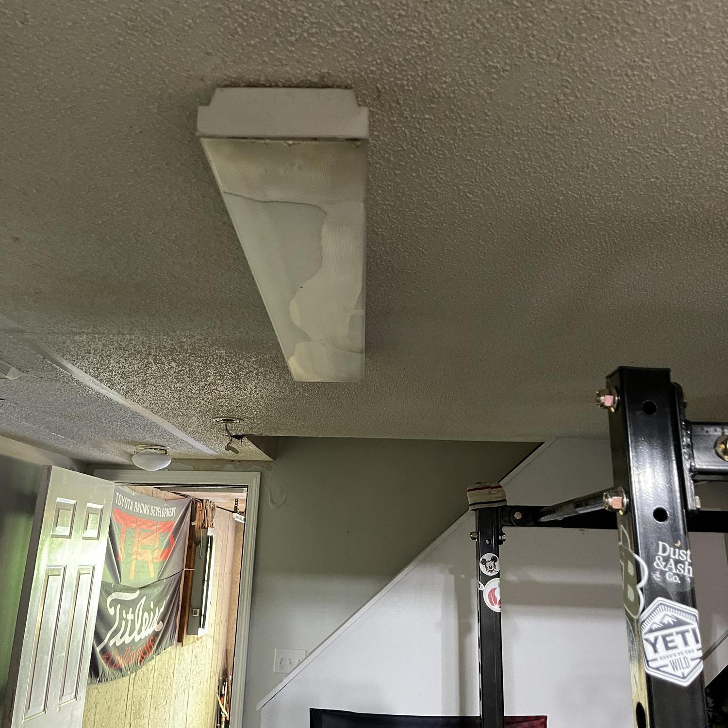 Basement light fixture full of water
