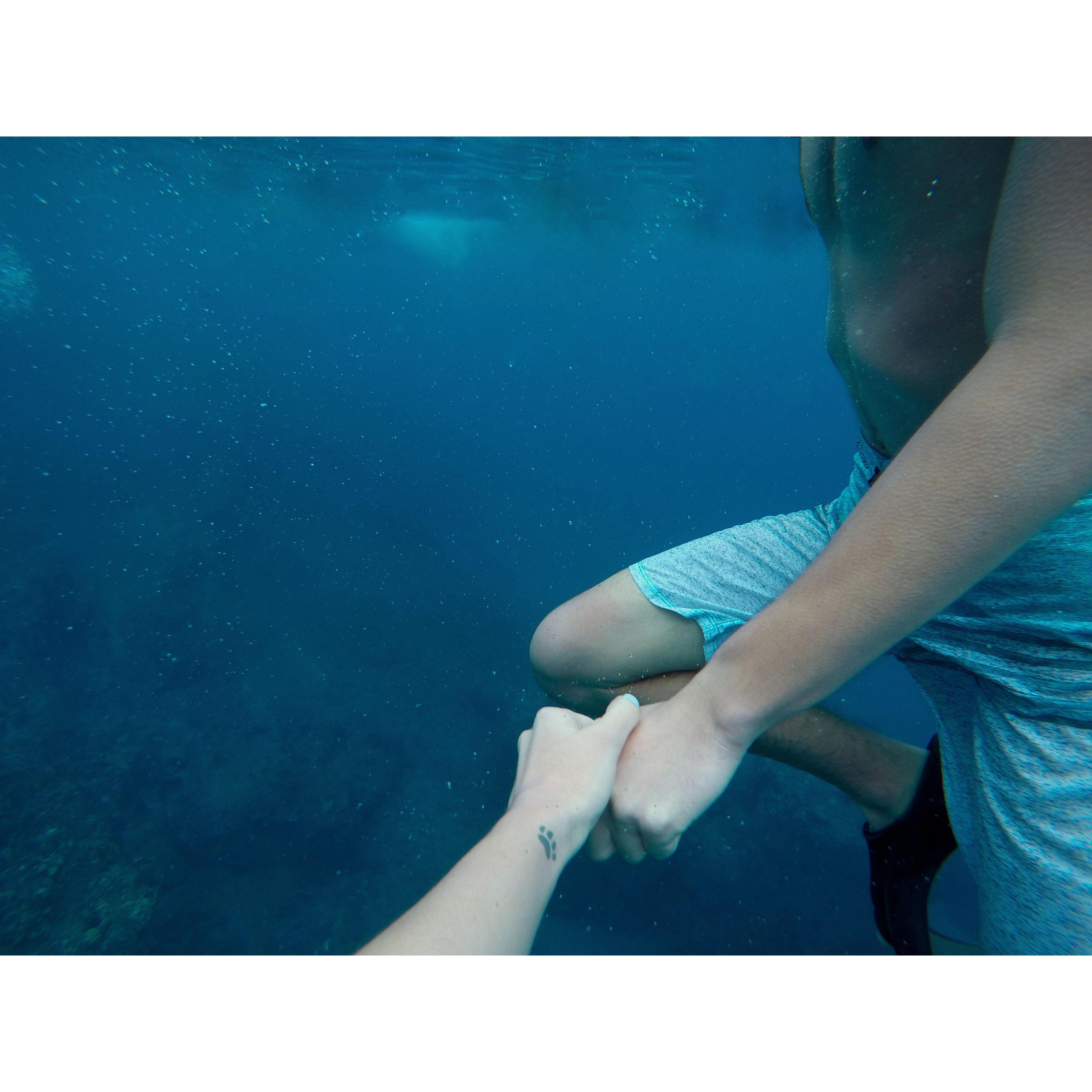 Snorkeling in Hawaii, one of our favorite pictures together.