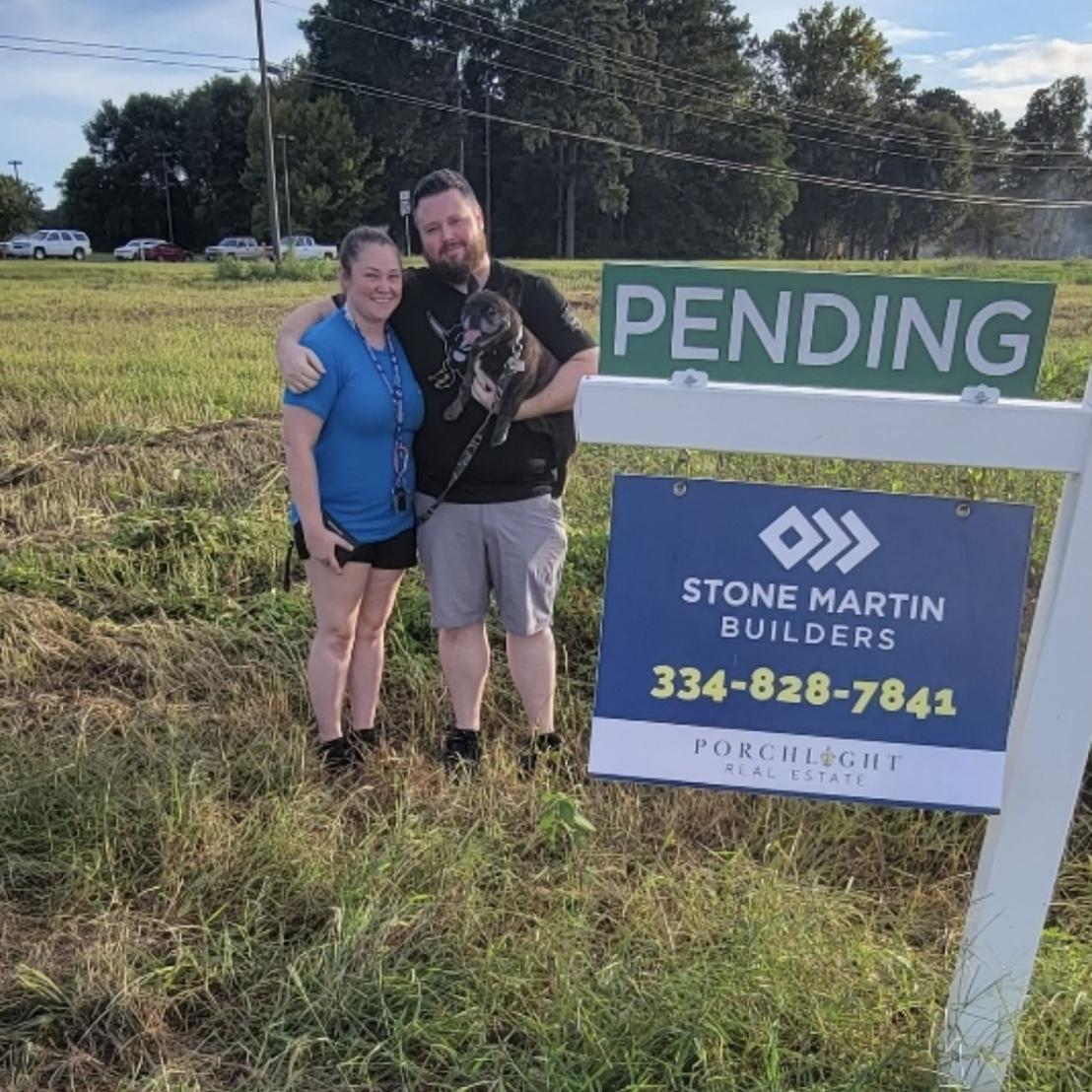 First family photo in front of our property