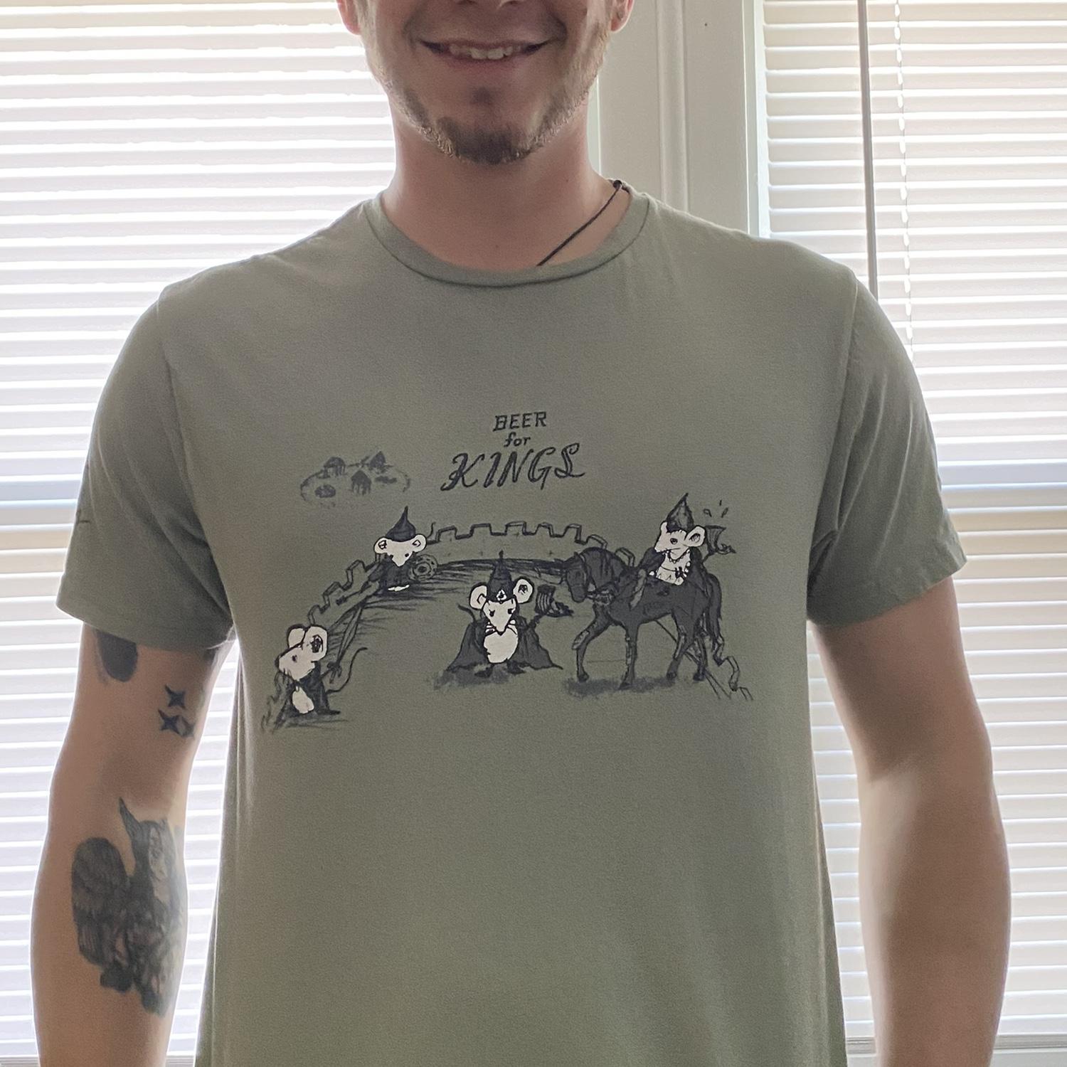 Kari bought this shirt for Brad on a trip to Chicago and the following year bought the complimentary shirt that says “beer for peasants.”