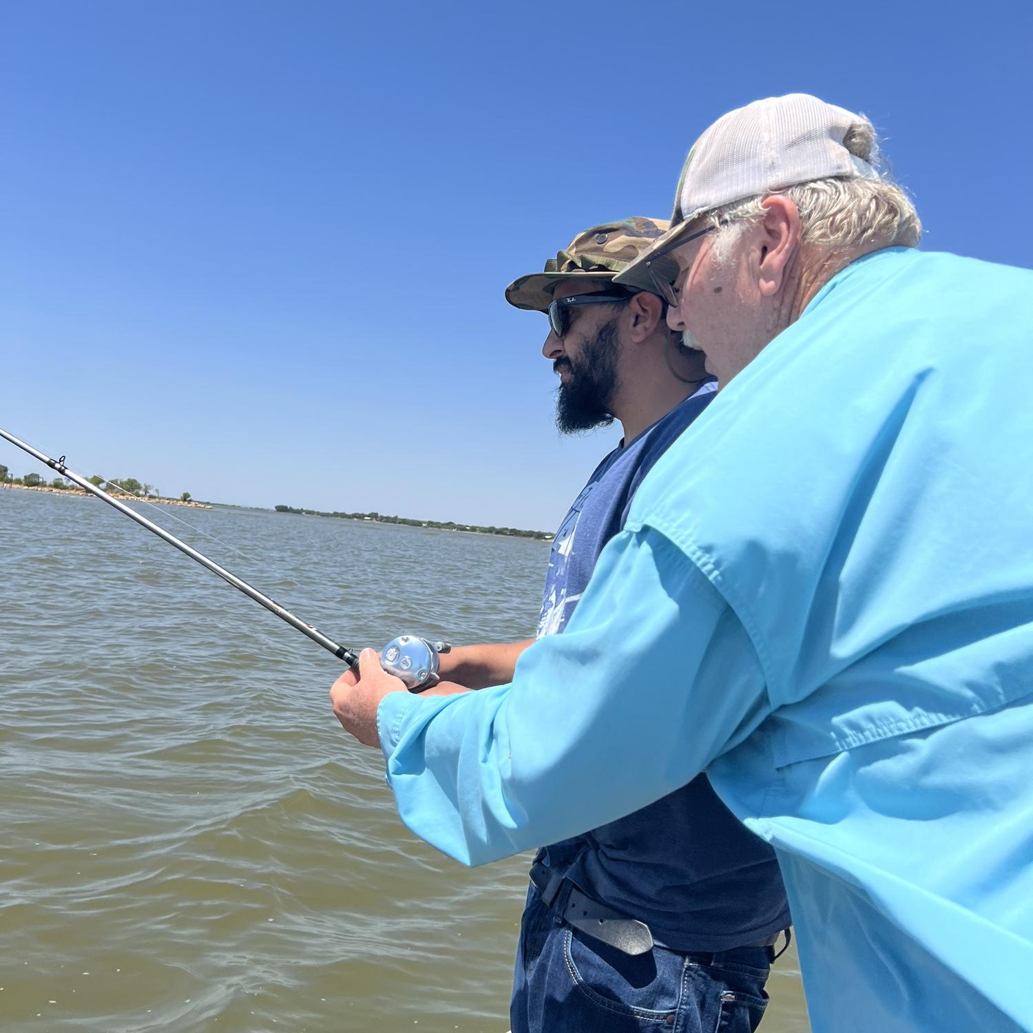 Uncle Danny showing JJ how to hook the big ones!