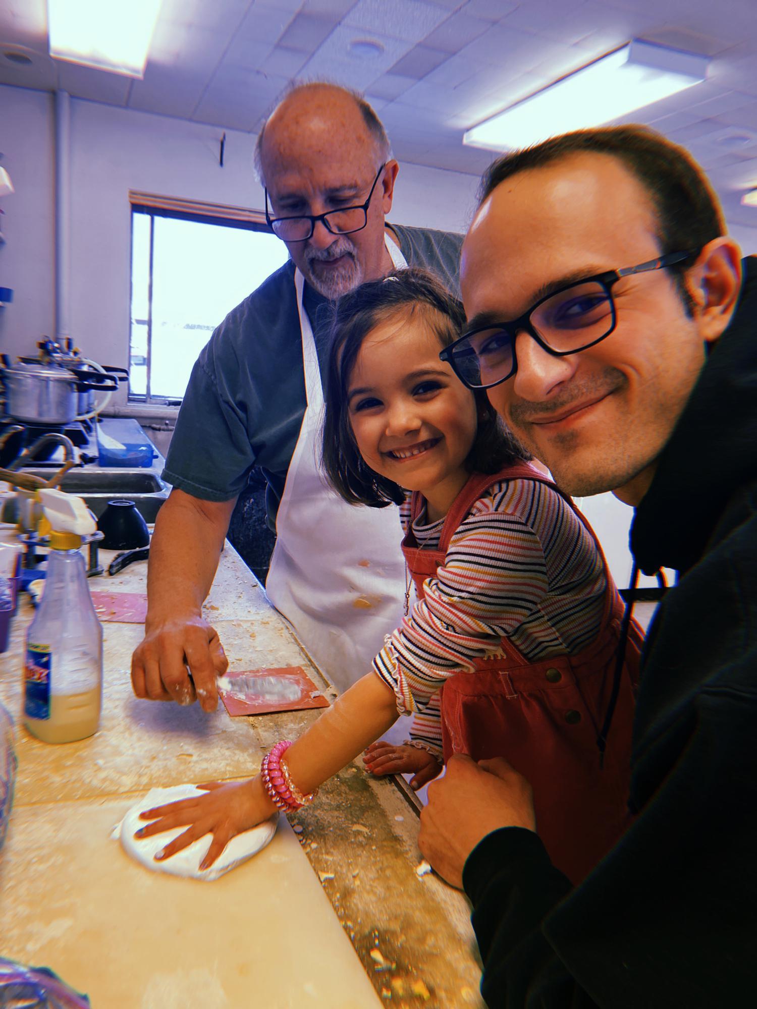 Making handprints with Grandpa Hawgy.