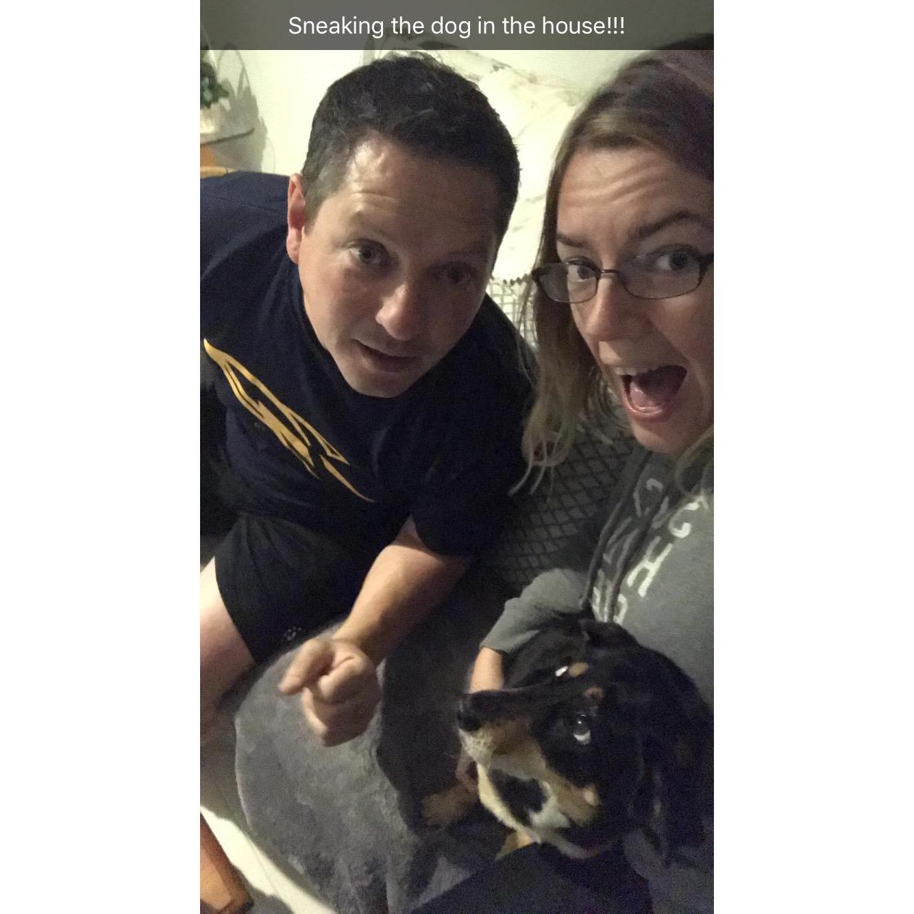 Steve and I sneaking Mollie into the living room at my parents house!!