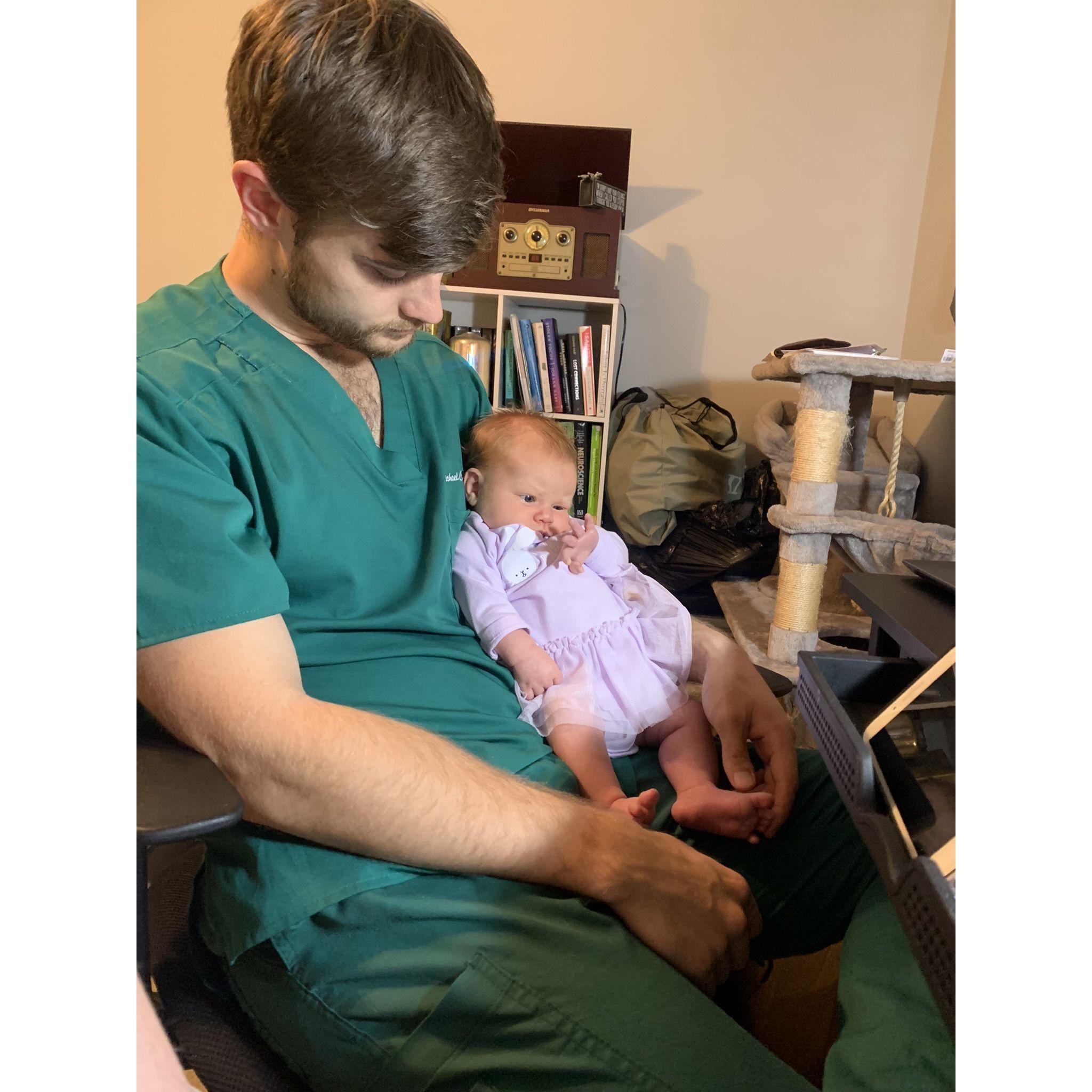 Hanging out with dad while he studies!