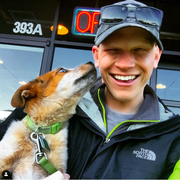 Dan in his happy place with a puppy!