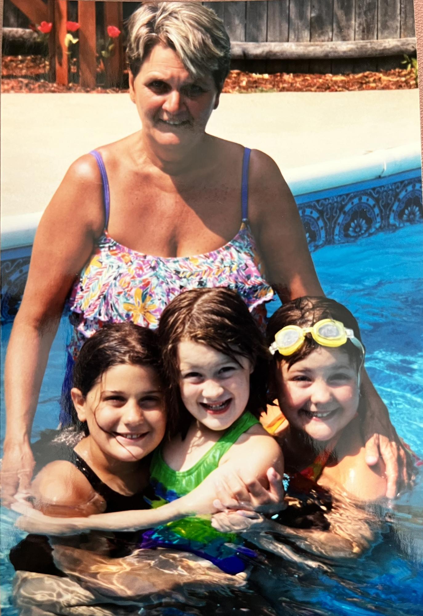 Stephanie and her sisters with their grandma, Nannie (Marilyn)