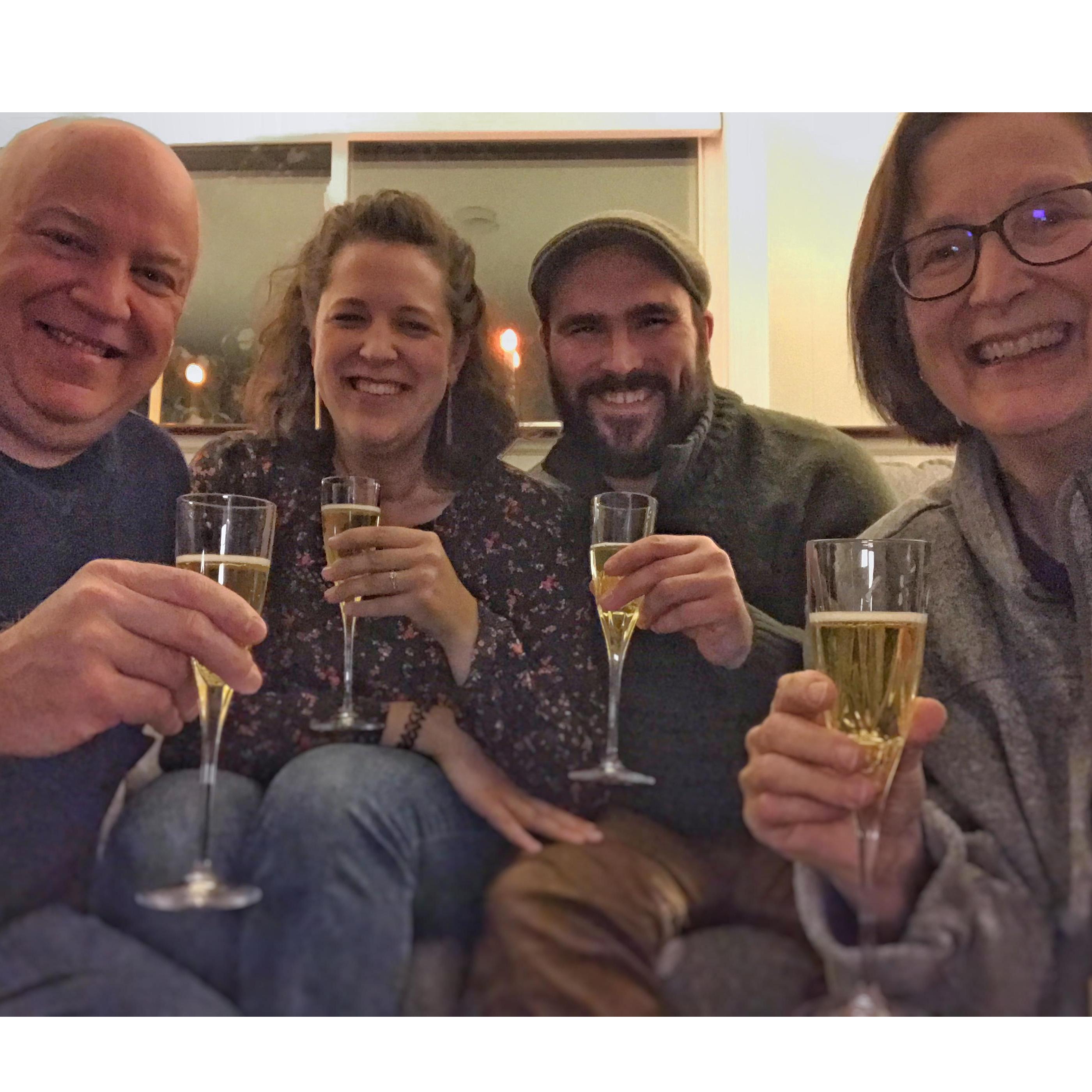 The night we got engaged, sharing a toast with Scott & Cathy Stenquist (parents of the bride); December 23rd, 2020