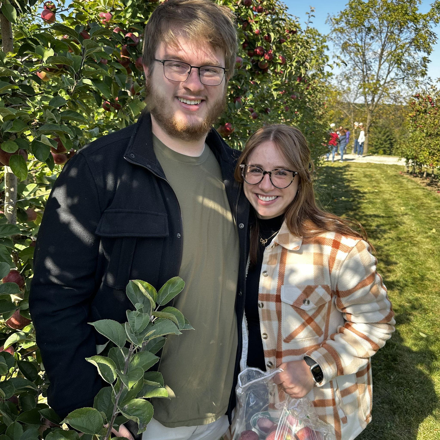First-year teachers apple picking together.
