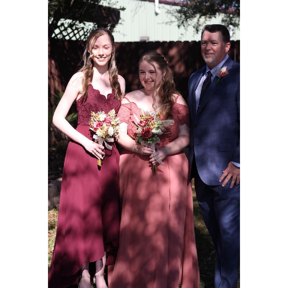 Baleigh and Taylor serving in a wedding.
