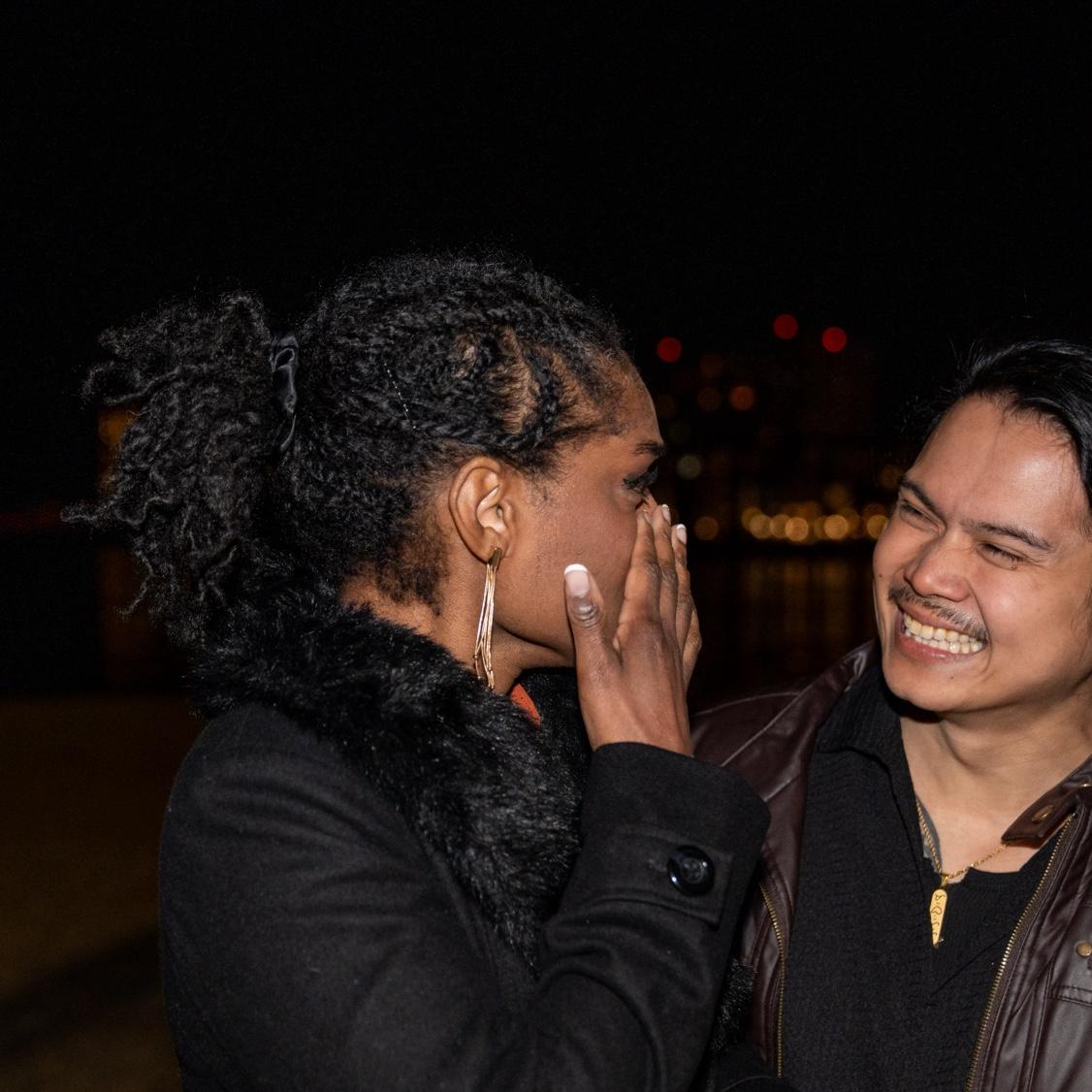 Morgan crying, while Carl is laughing.
