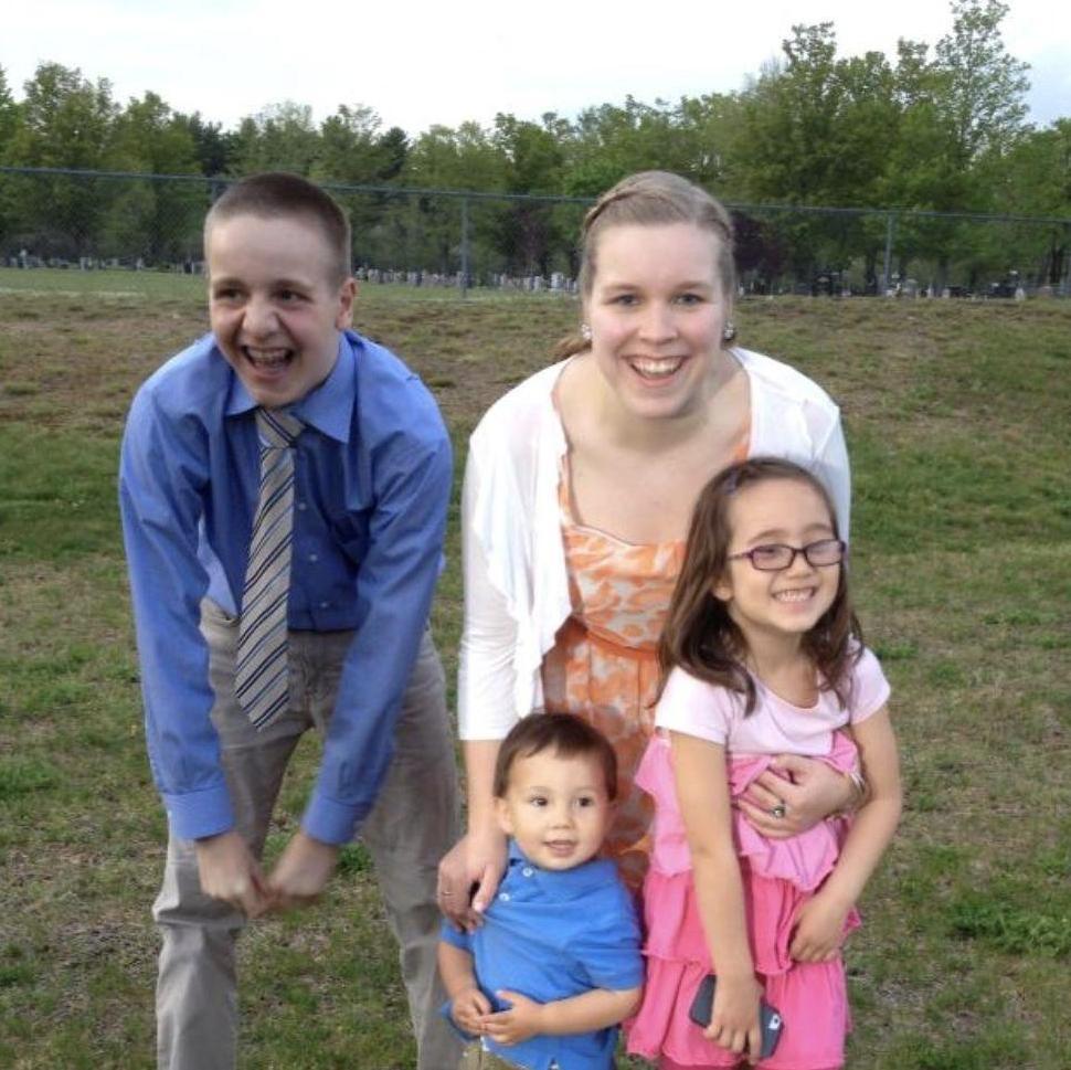 Jason, Carol, Sophie, & Xander giggling after an OHS Honor Society event
