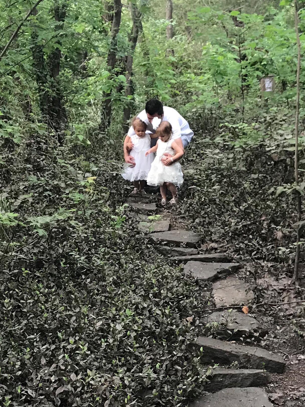 Daddy and daughters on the trail
