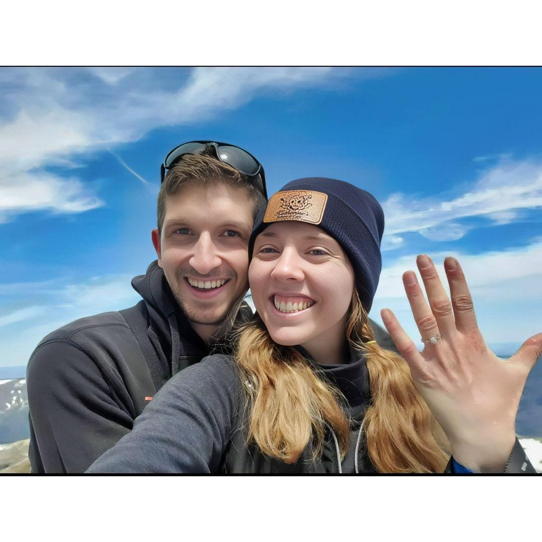 Our first picture as an engaged couple! We got engaged on Mt. Washington, after the hardest hike we've done.