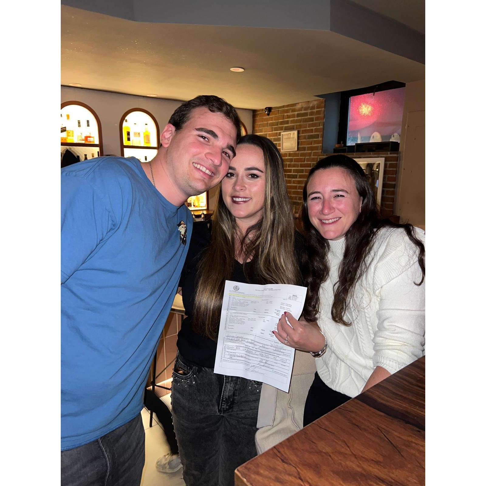 This is a picture of Derek, his older sister Celine, and Daniella celebrating their legal marriage at a bar in Chelsea!