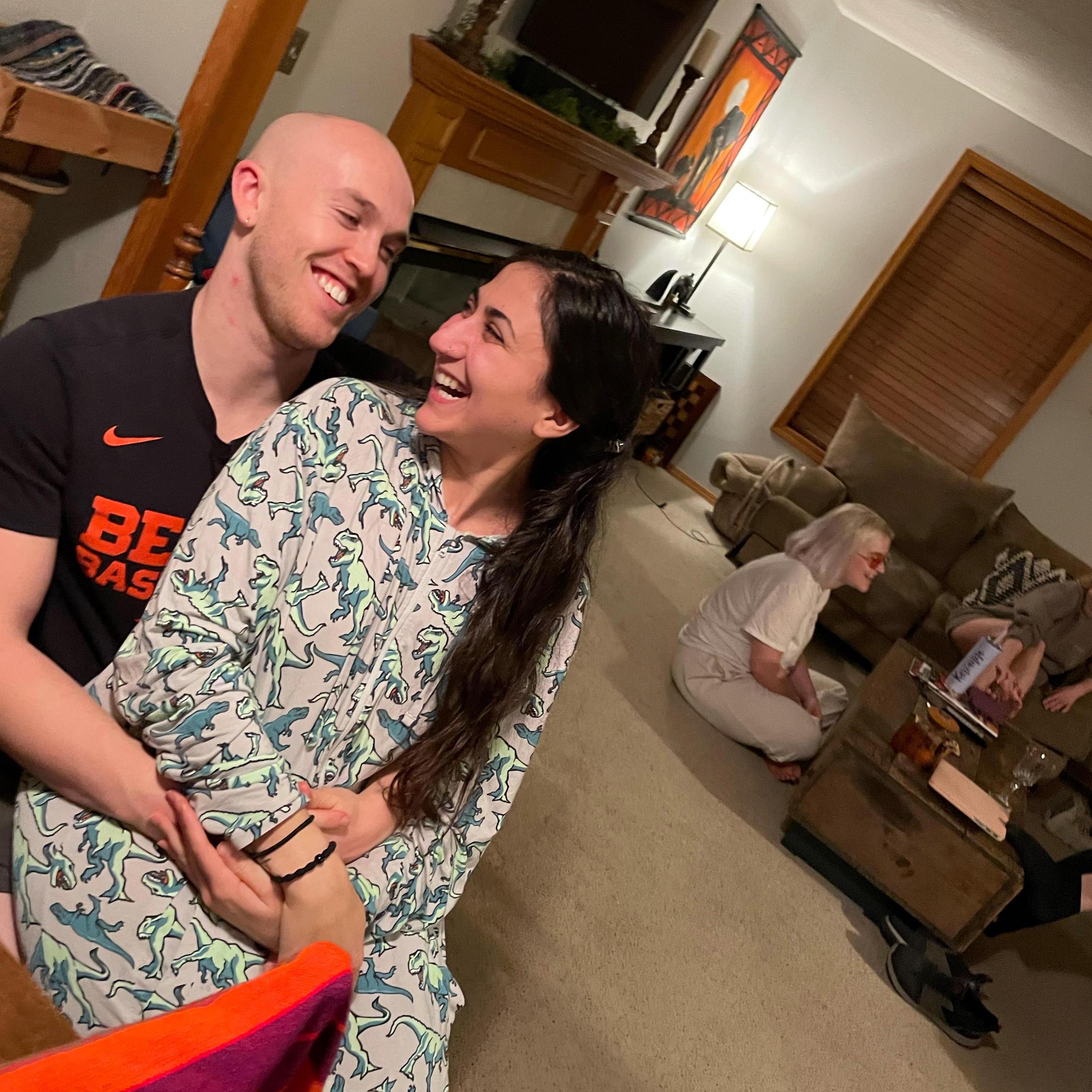 The day that we told his family that we were planning to get engaged-- and yes that is what Vienna was wearing, a full-on dinosaur onesie.
