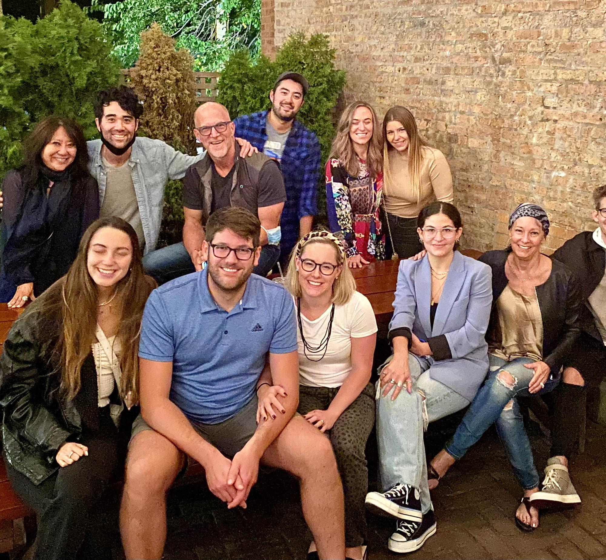 (Most of) the combined Formolo-Mans families and their spouses out to dinner together in Chicago!