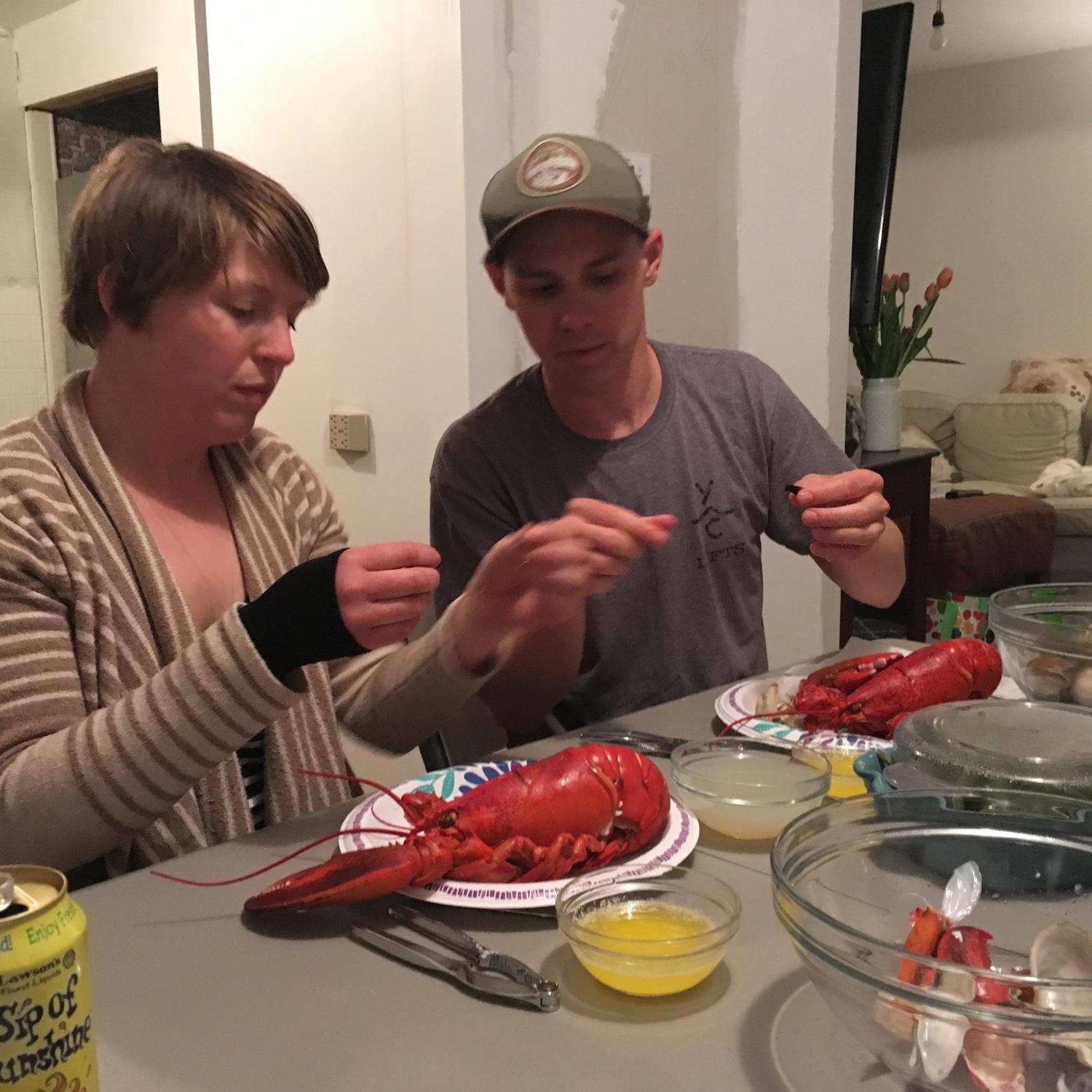 Teaching Lindsay to eat a lobster in Kait + Trygg's first house in Portsmouth, NH