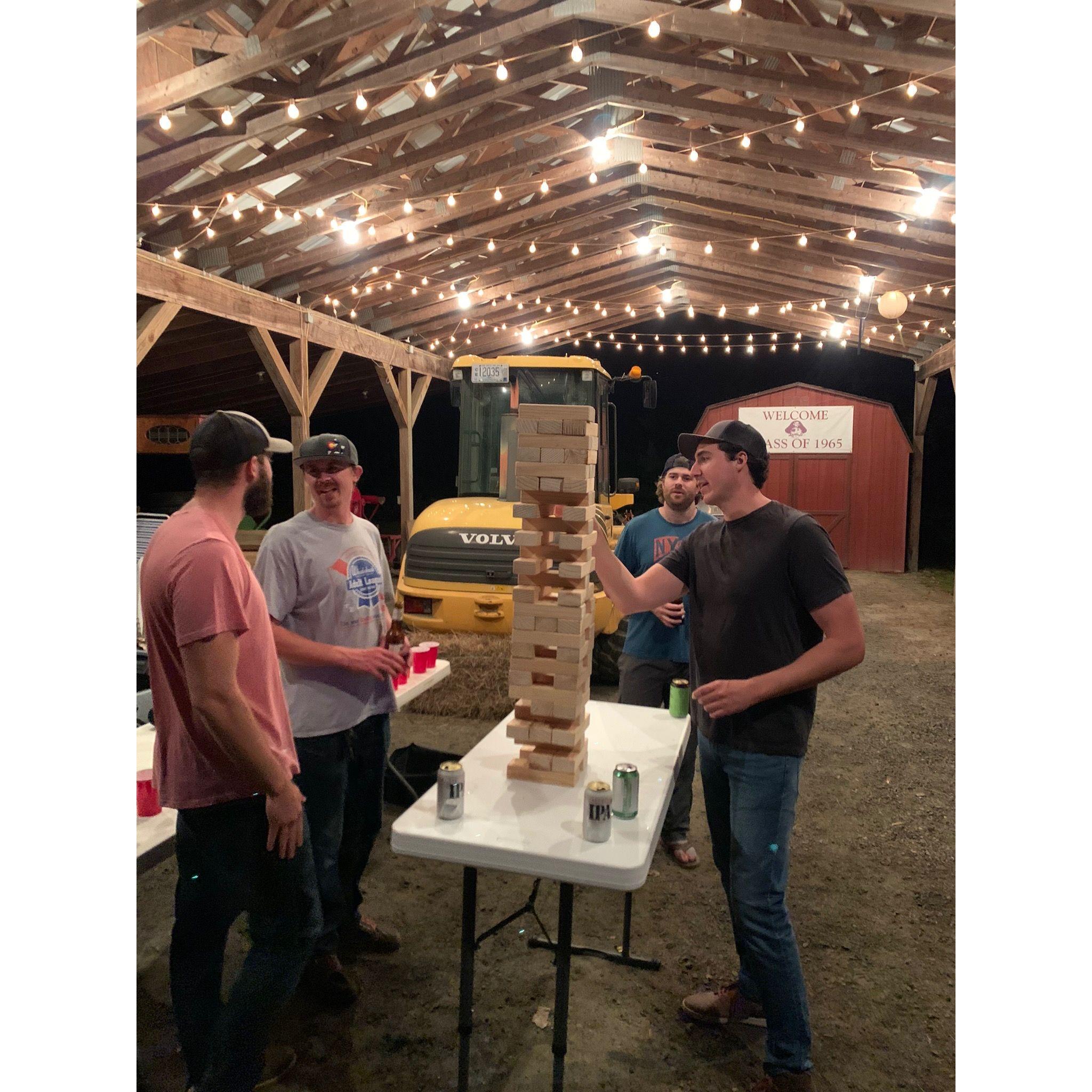 Marc enjoying jenga with childhood friends in Hanover