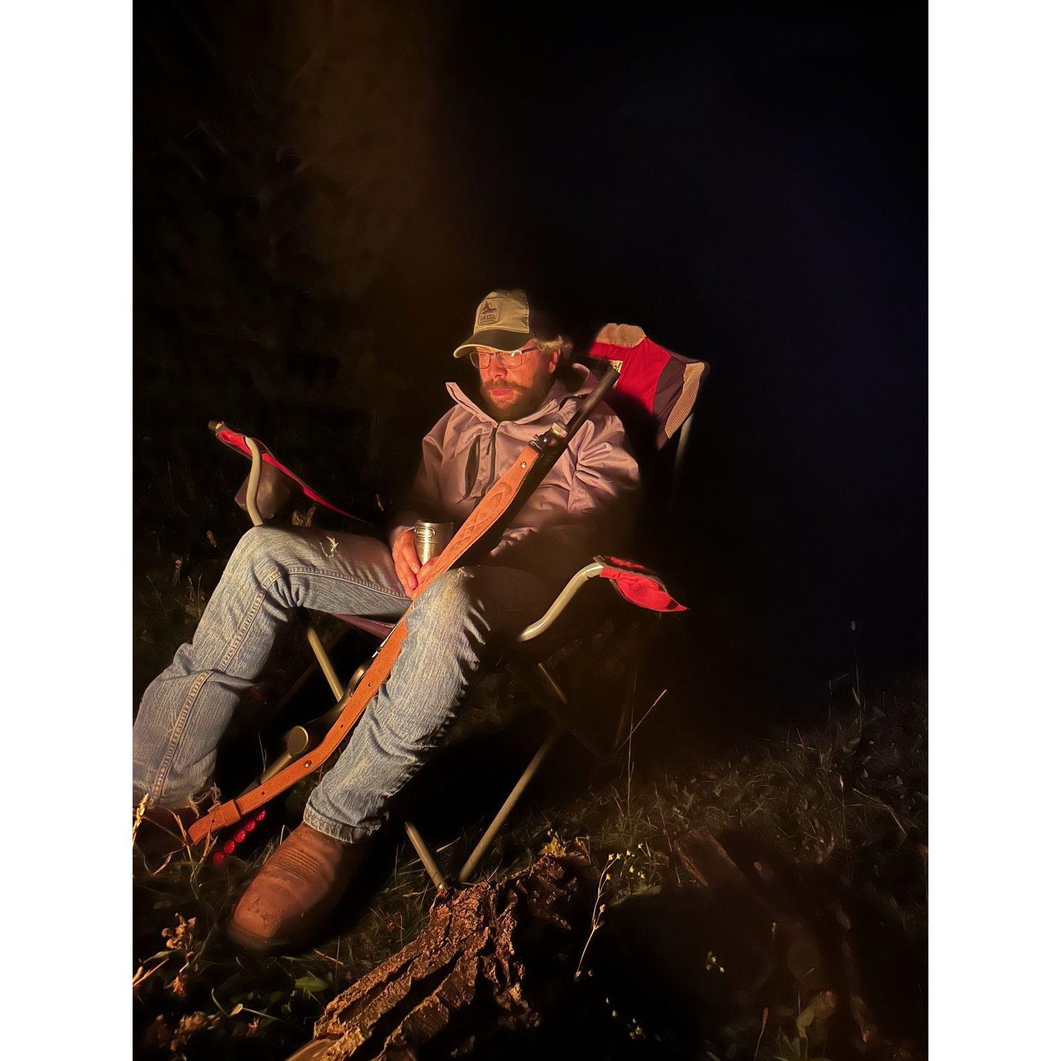A common site, sitting by the fire with a whiskey and gun in hand.