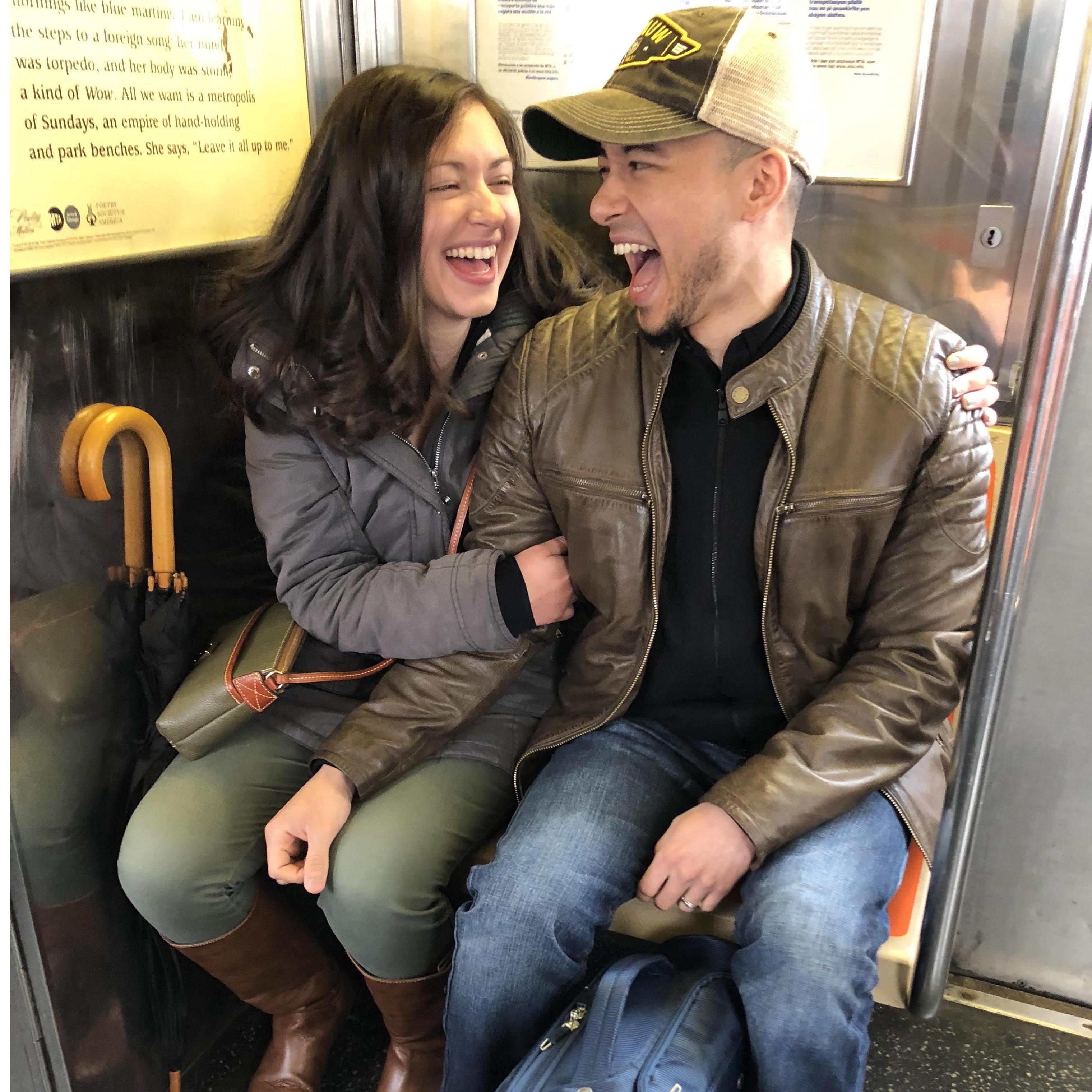 April 27, 2018: Us laughing on the subway as Jeronimo took our picture!