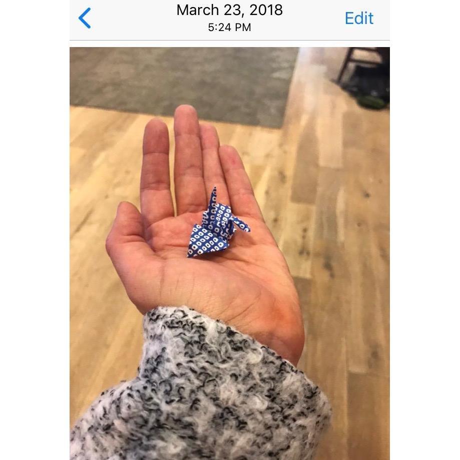 This the crane that the waitress gave to us on our very first date for good luck.  Note the timestamp: Samantha took a photo of it that very night.  We still have it!