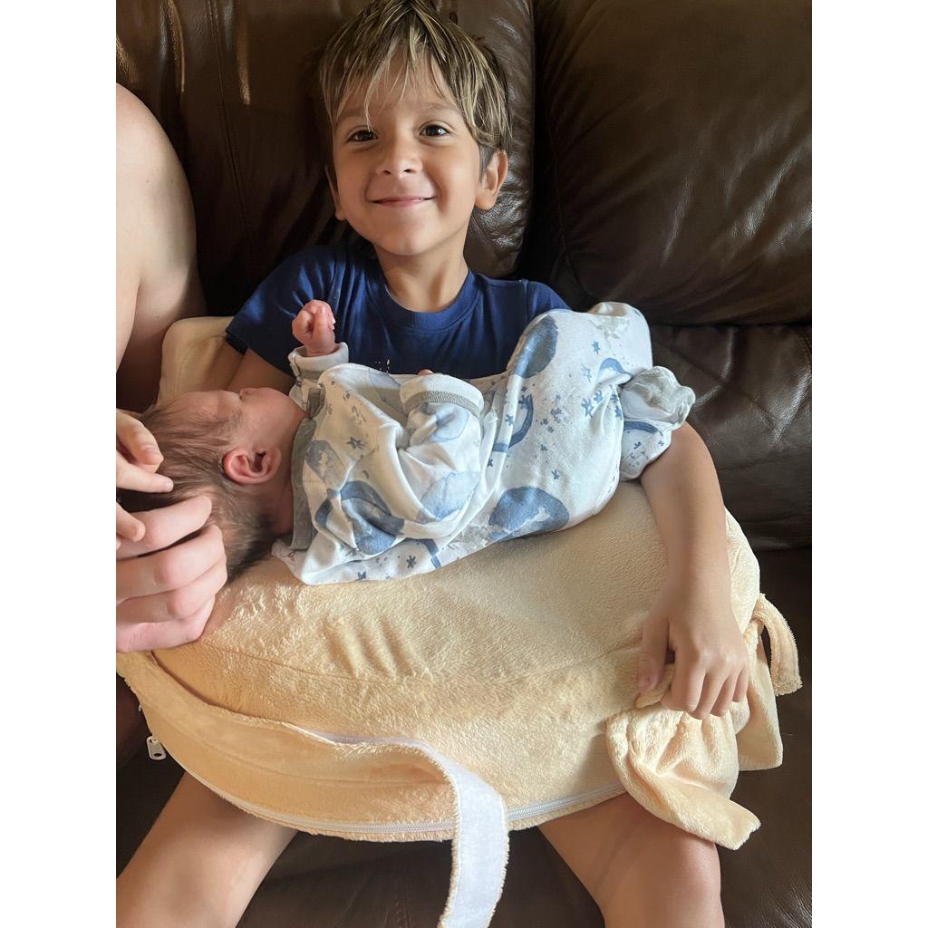 Eli meeting his new brother